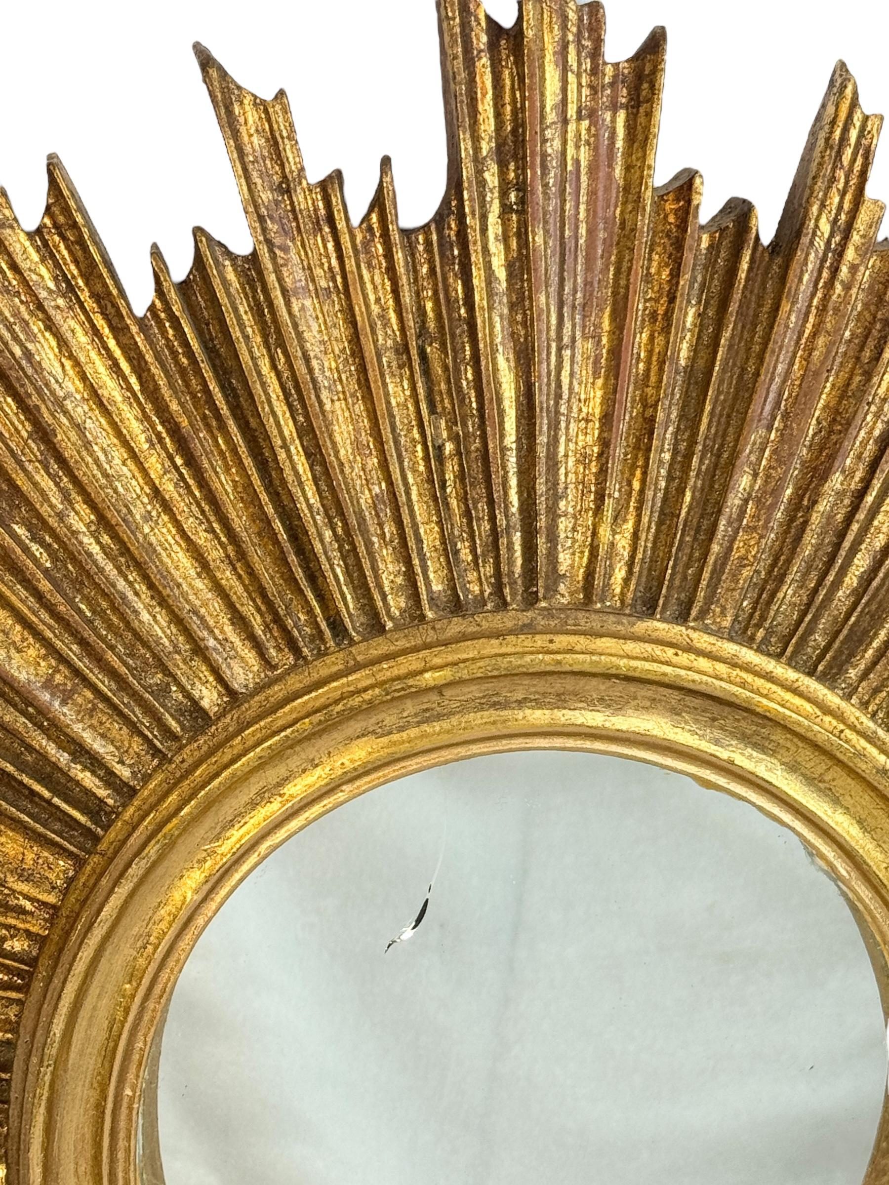Gilt Beautiful Starburst Sunburst Gilded Resin Convex Mirror Belgium, circa 1970s For Sale