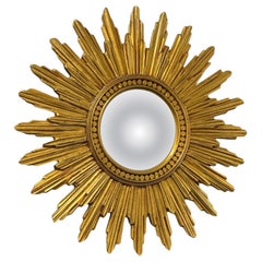 Magnifique miroir convexe en résine dorée, motif « Starburst » et « Sunburst », France, CIRCA les années 1960