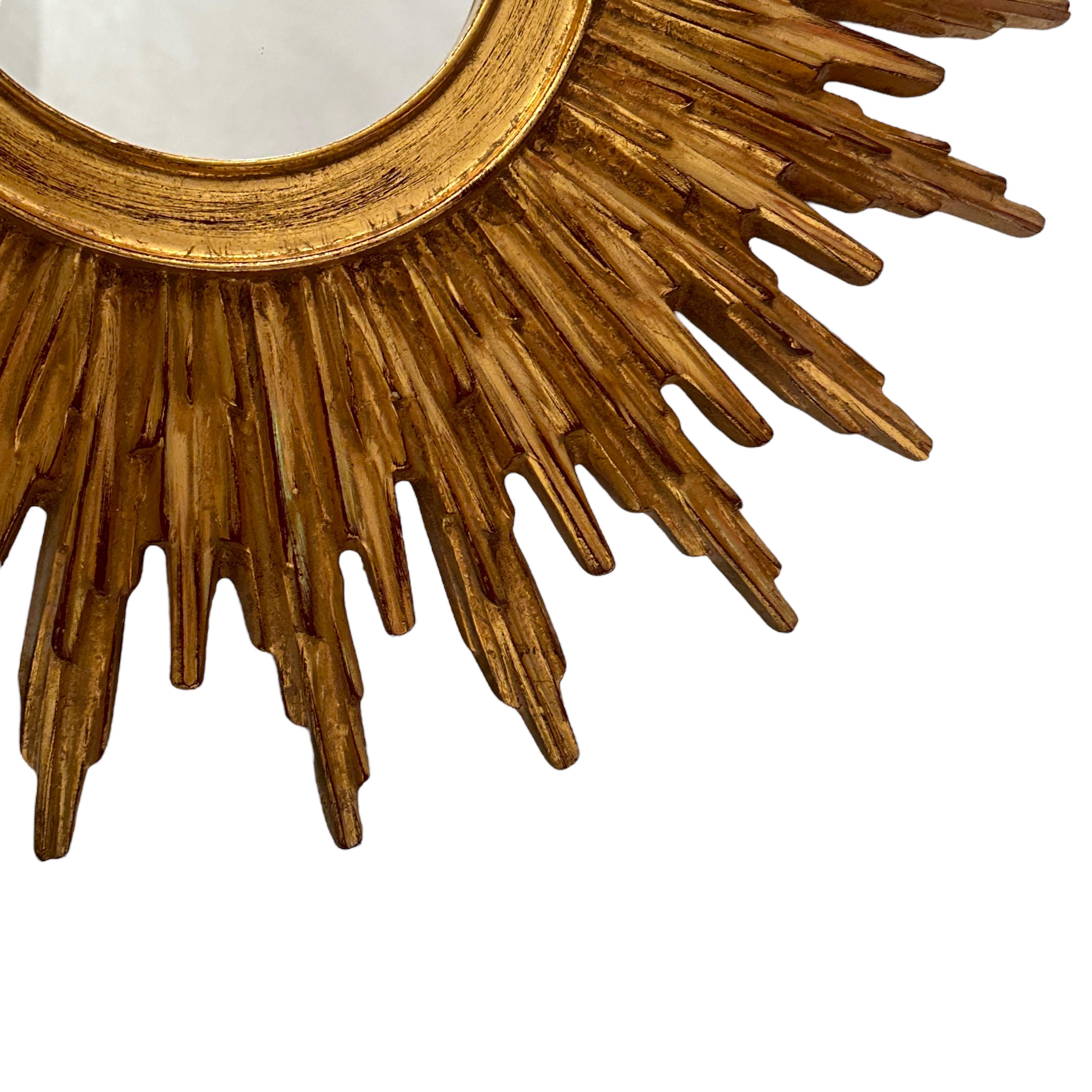 Hollywood Regency Beautiful Starburst Sunburst Gilded Resin Mirror Belgium, circa 1960s