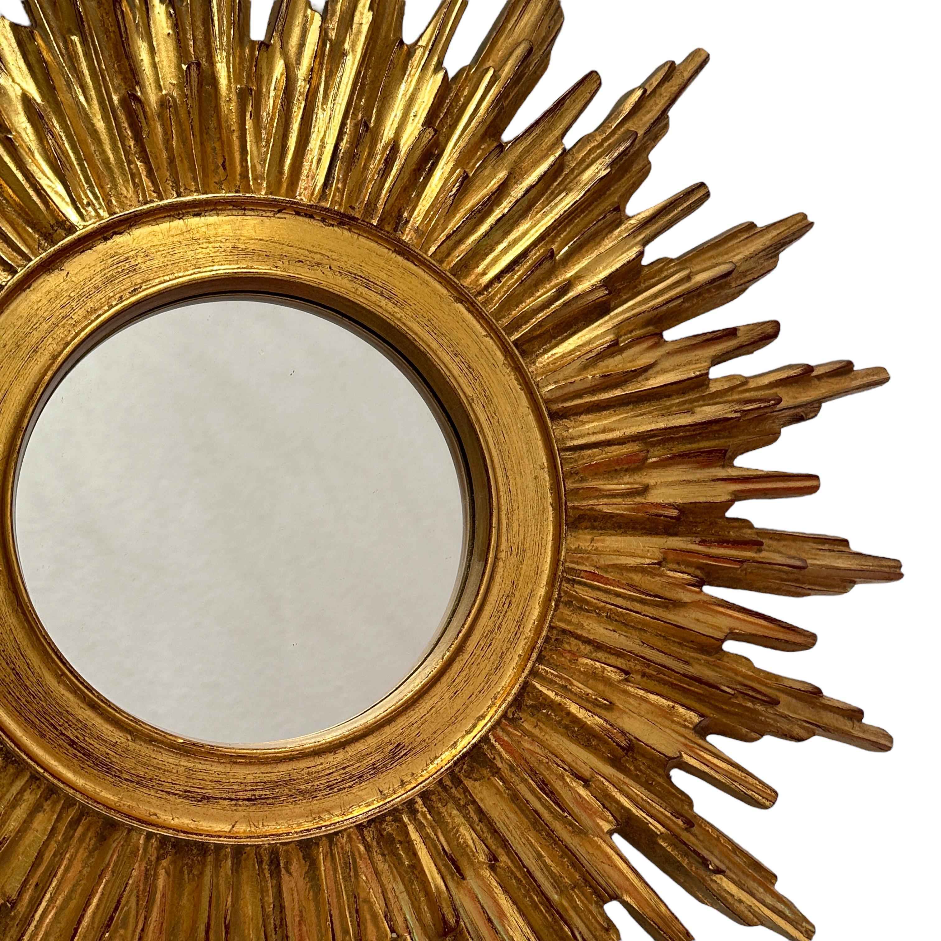 Belgian Beautiful Starburst Sunburst Gilded Resin Mirror Belgium, circa 1960s