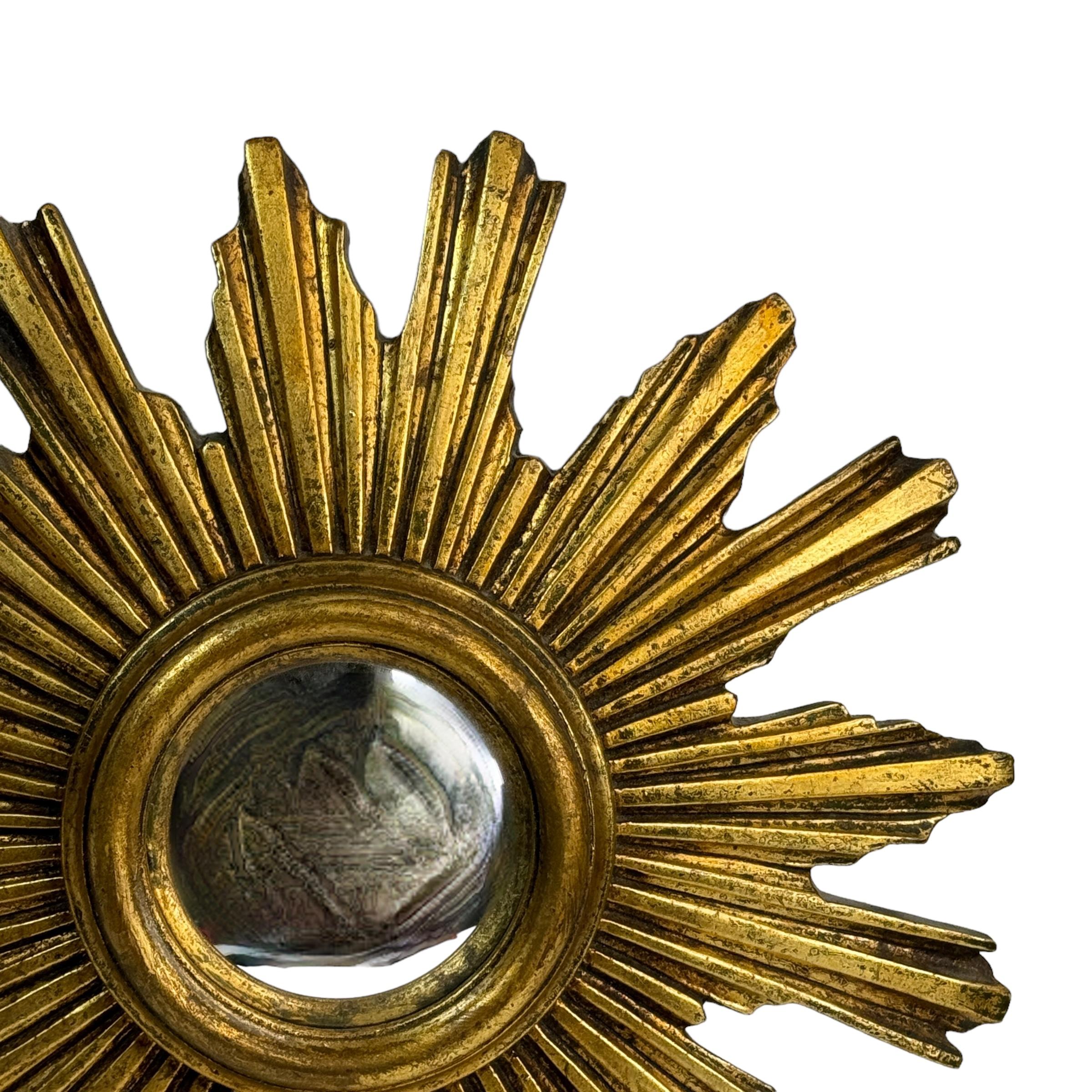 Belgian Beautiful Starburst Sunburst Gilded Resin Convex Mirror Belgium, circa 1960s For Sale