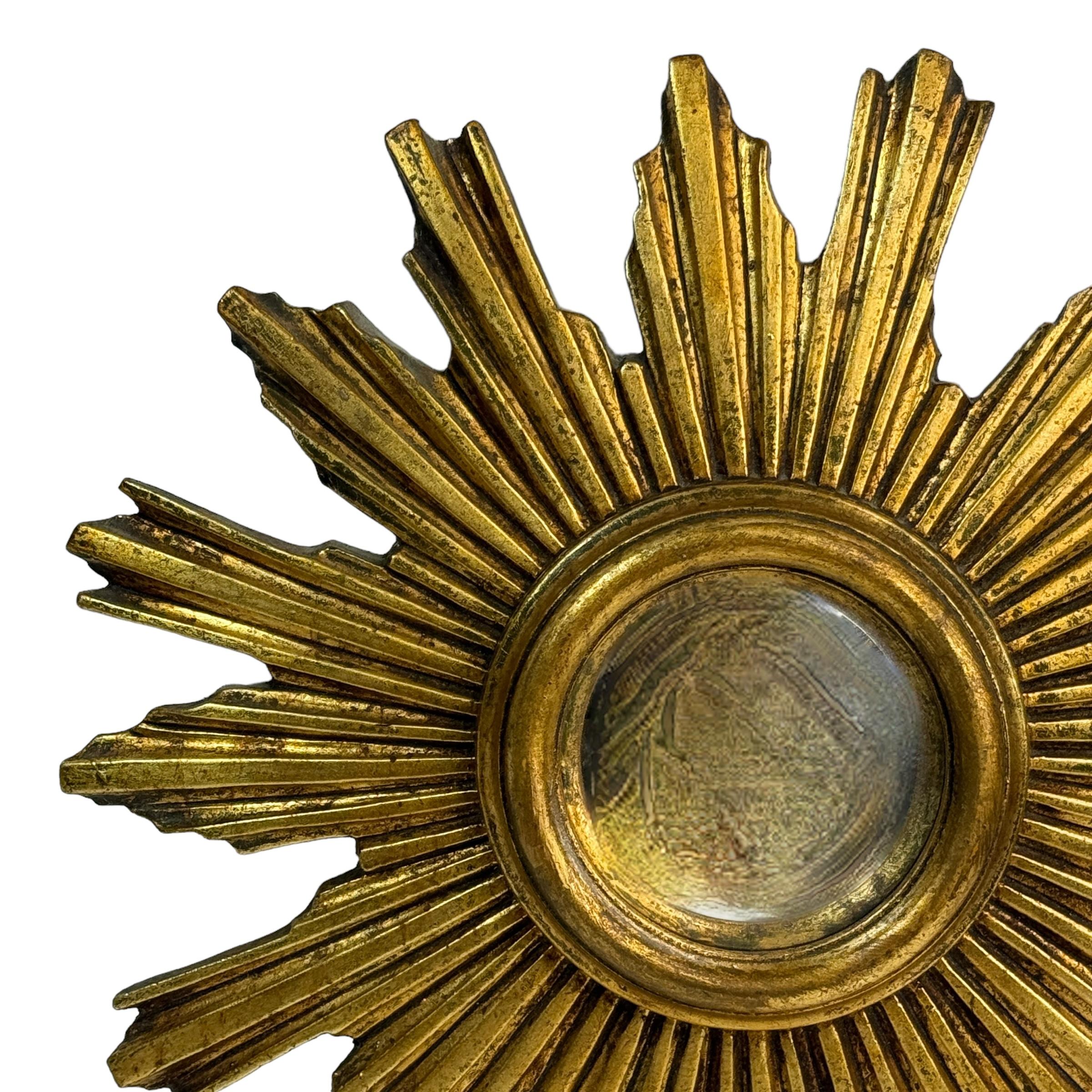 Gilt Beautiful Starburst Sunburst Gilded Resin Convex Mirror Belgium, circa 1960s For Sale