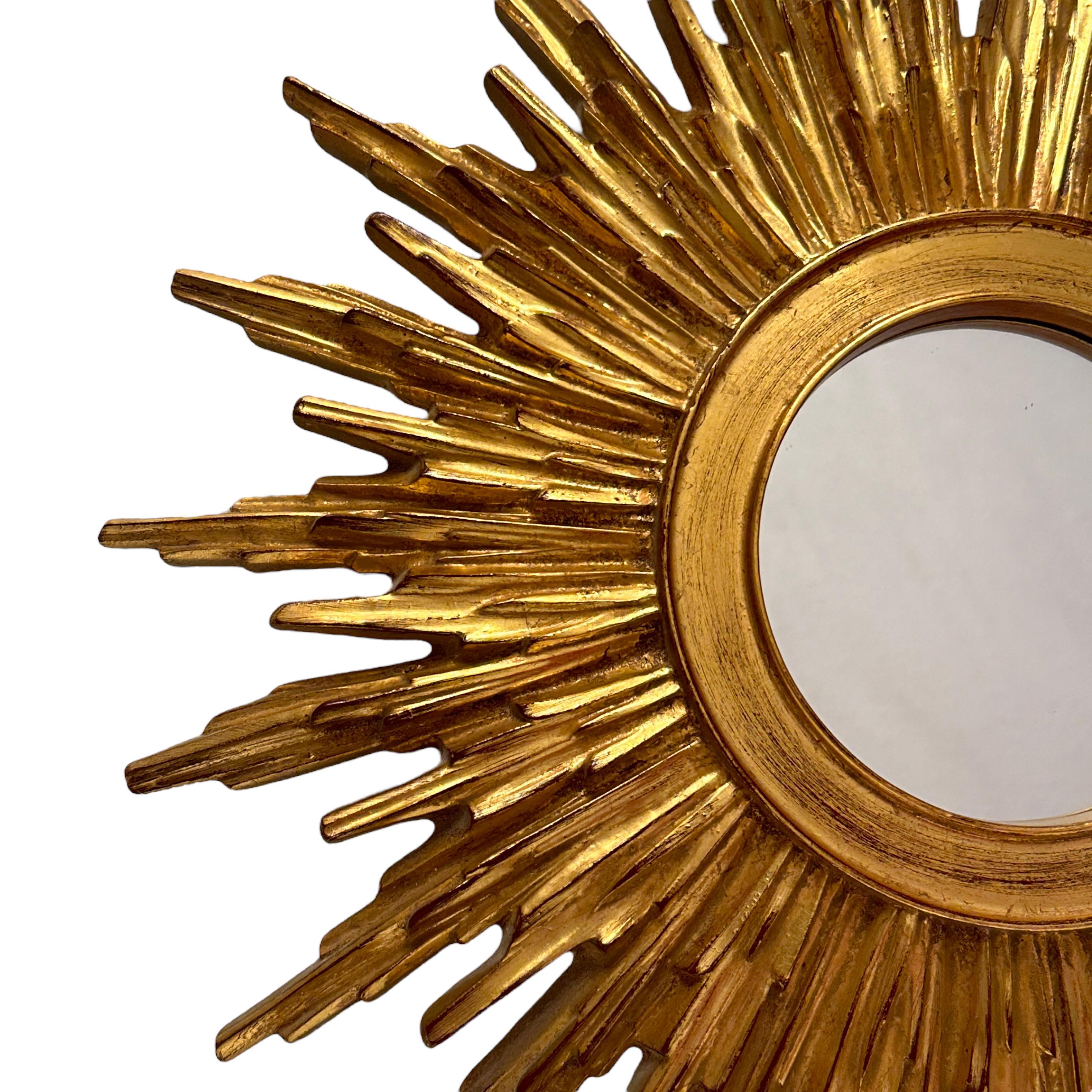 Mid-20th Century Beautiful Starburst Sunburst Gilded Resin Mirror Belgium, circa 1960s
