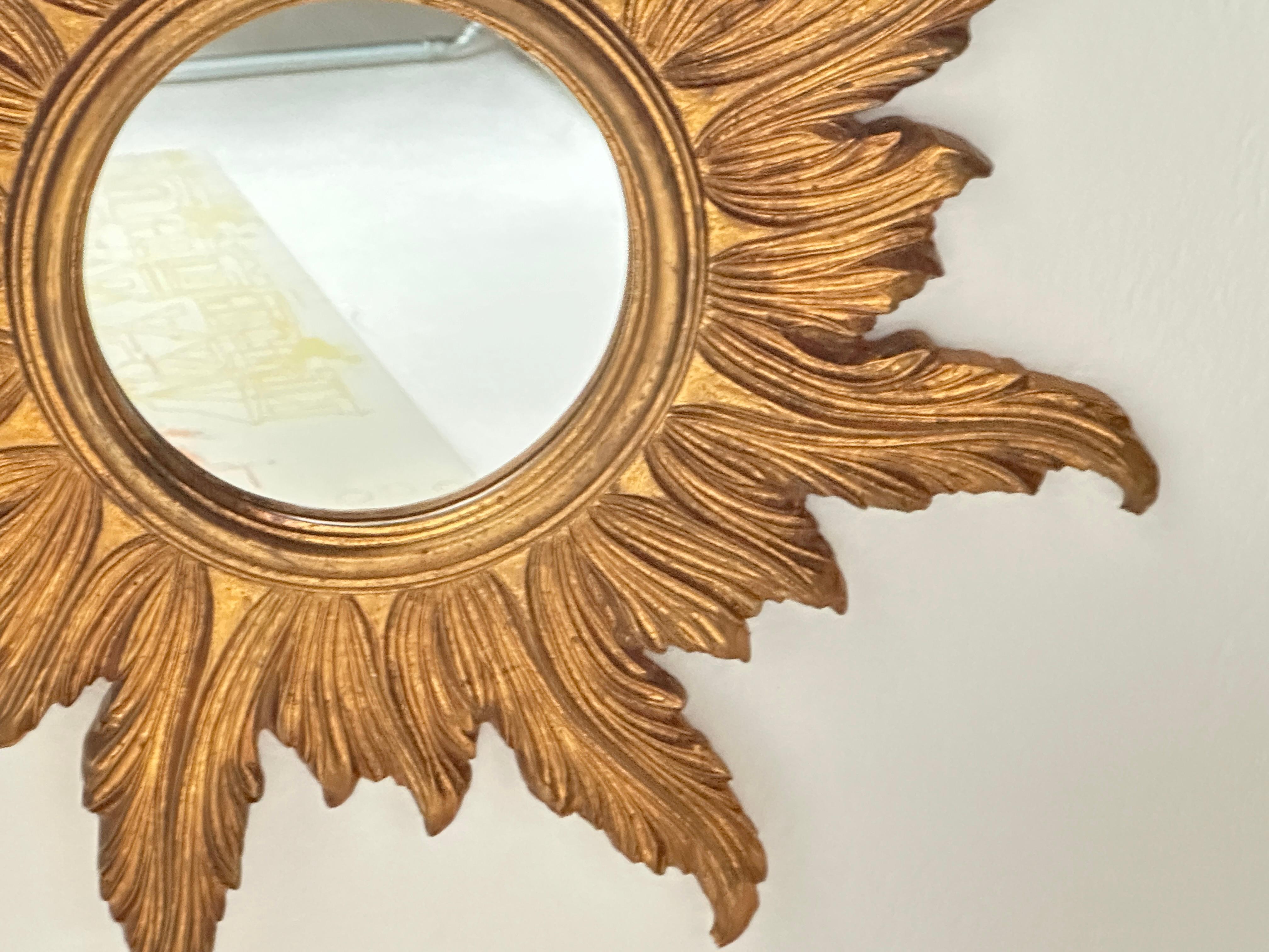 Hollywood Regency Magnifique miroir en étoile de soleil, composition et bois dorés, Autriche, années 1960 en vente