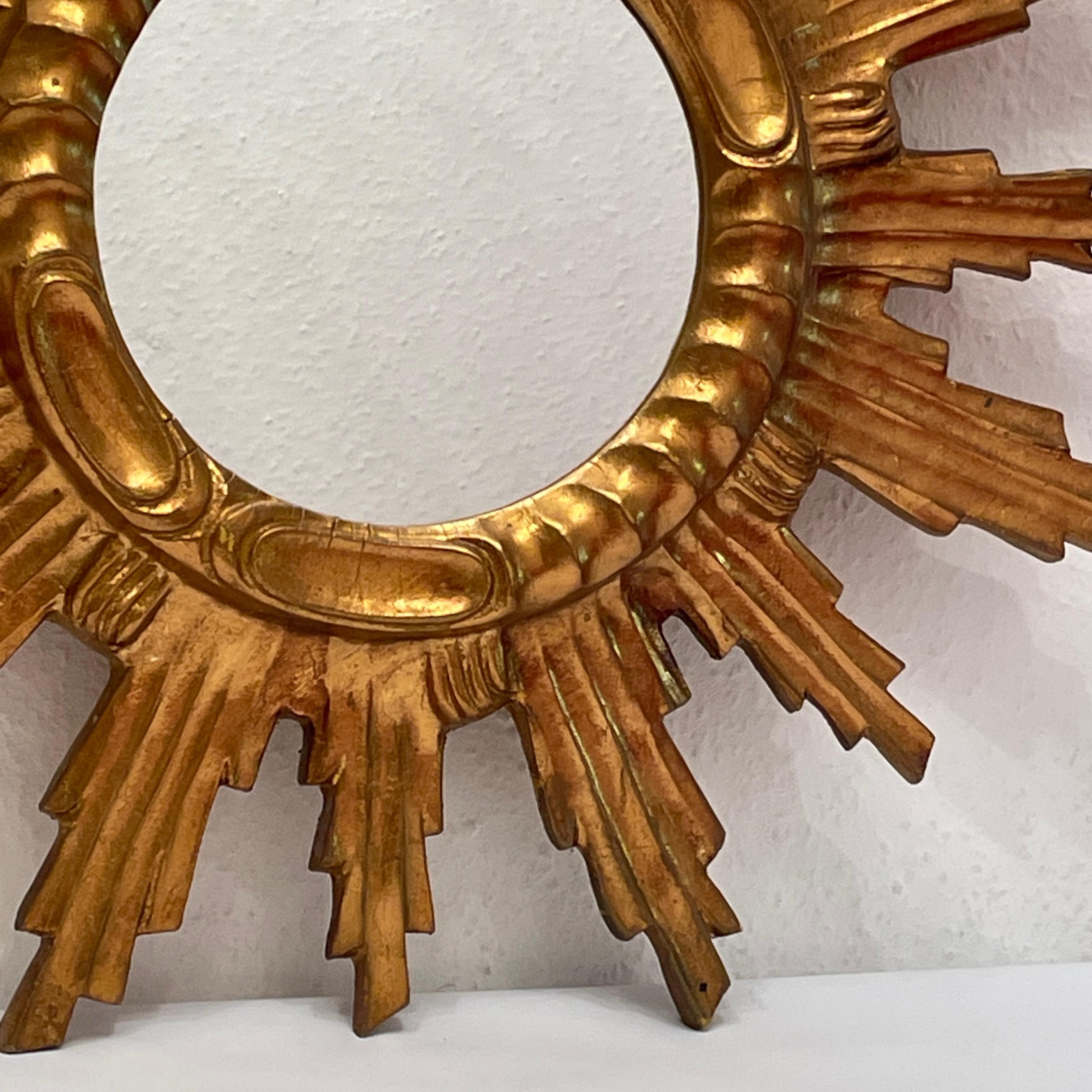 Hollywood Regency Magnifique miroir en forme d'étoile rayonnante, composition et bois dorés, Italie, années 1960 en vente