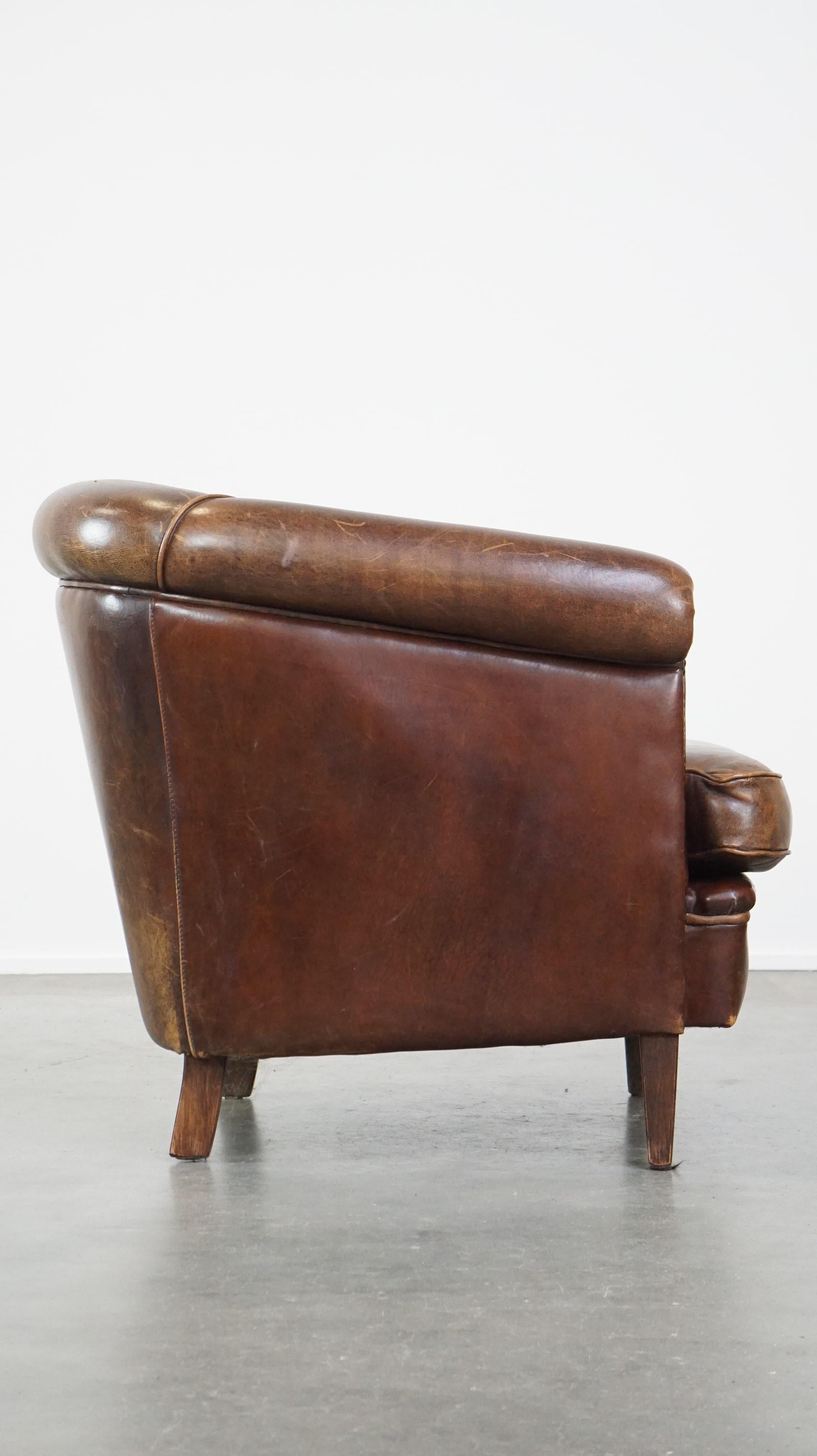 Hand-Crafted Beautiful stately English-style sheepskin club armchair with a luxurious finish For Sale