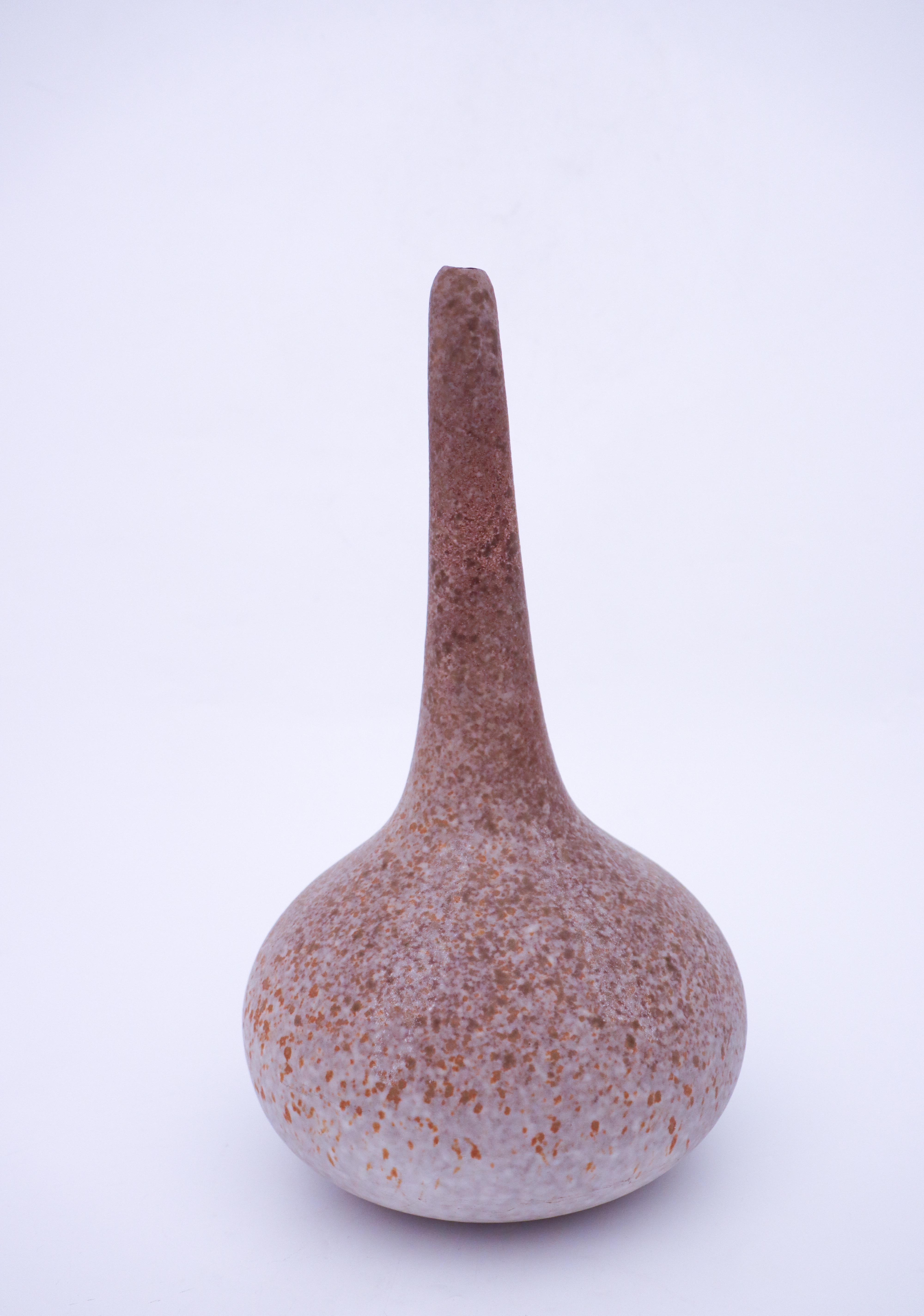 A beautiful stoneware vase designed by Paul Hoff at Gustavsberg. It is more of a sculpture than a vase but it has a small hole at the top. The vase is 37 cm (14,8
