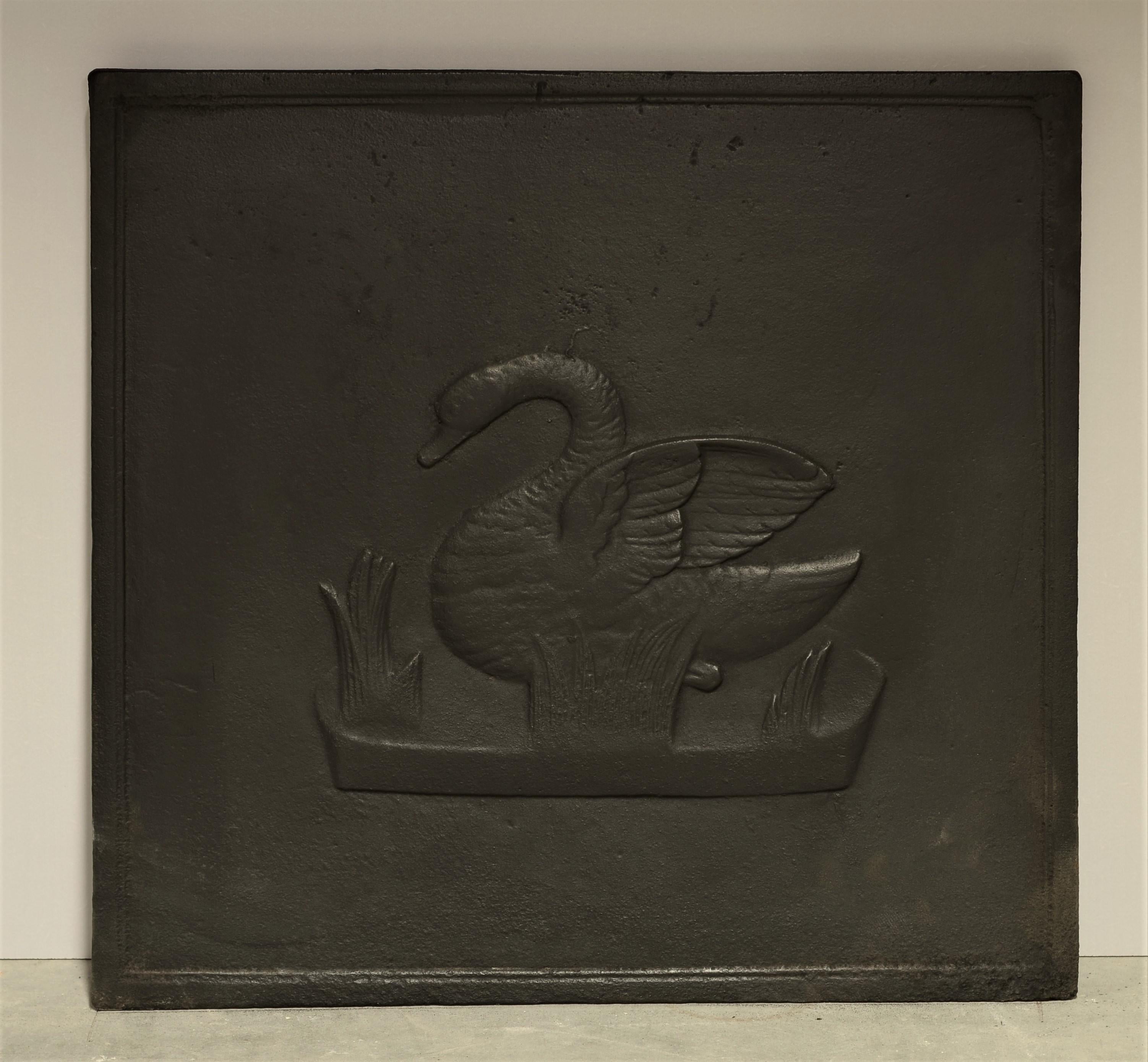 Beautiful cast iron square antique fireback or backsplash showing a swan spreading her wings.

Prefect condition and great usable size.

Sold by Schermerhorn Antique Fireplaces
Our vast collection of antique fireplaces is complemented by the