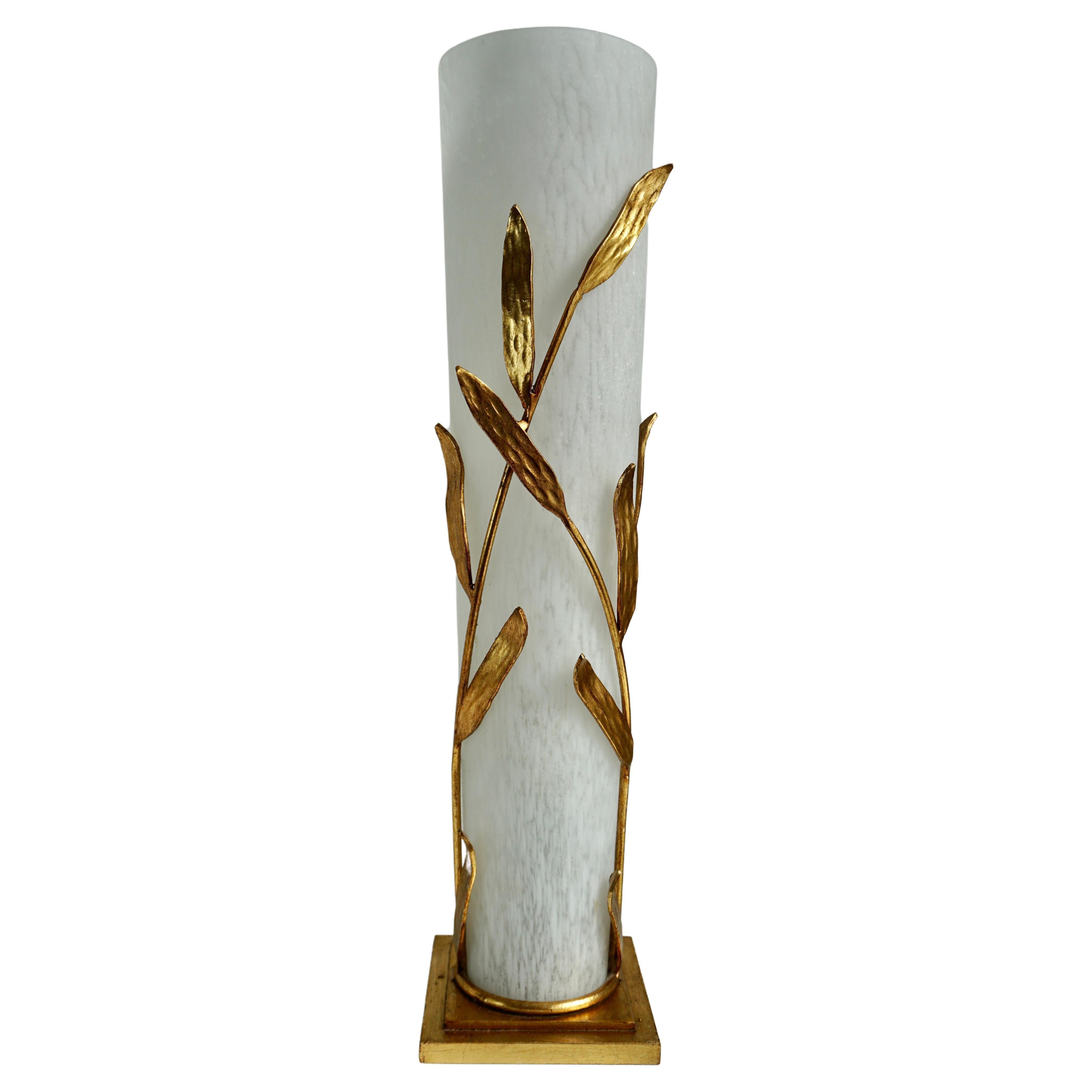 Beautiful table lamp in Murano Glass and gilded bronze leaves.

Height 67 cm.
Width 16 cm.
Depth 16 cm.

Weight 8 kg.
