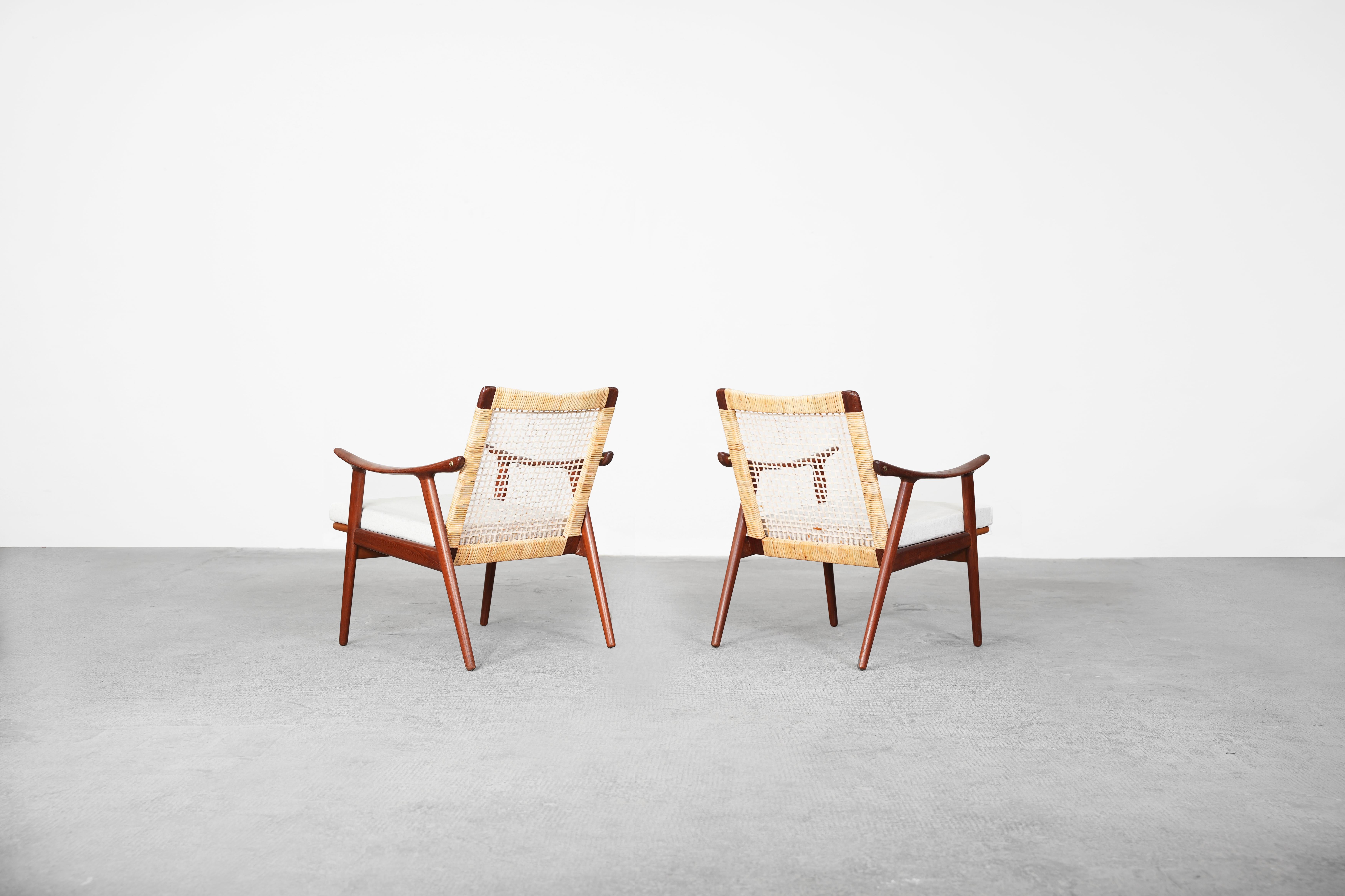 Very beautiful teak lounge chairs designed teak lounge chairs by Fredrik Kayser for Vatne Lenestolfabrik 1960s.
Very beautifully shaped, newly reupholstered with high quality in beige color, 
The cane and the wood frame are in great condition.