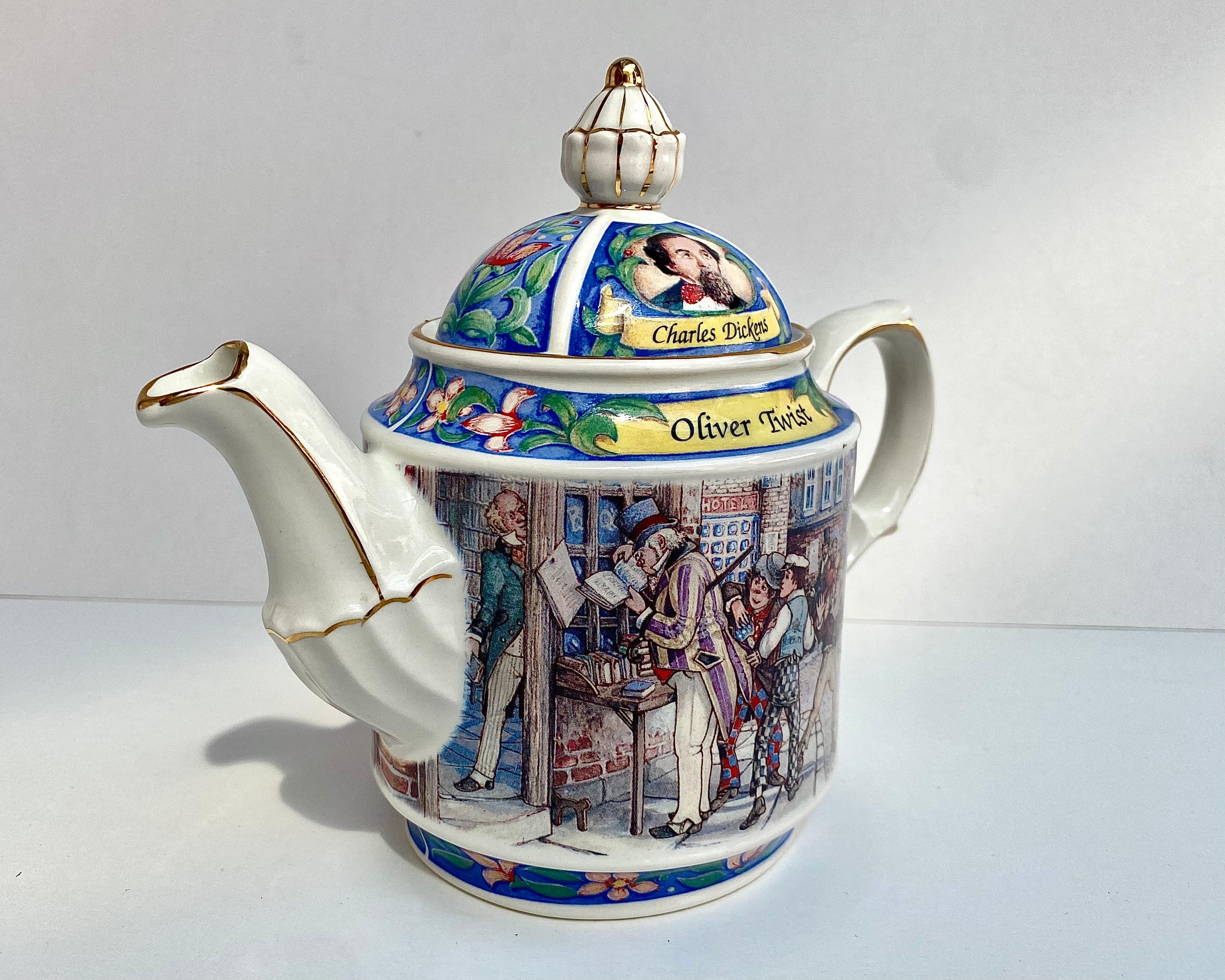 James Sadler Collectible Charles Dickins “Oliver Twist” Tea Pot with decal and gilding.

Made in England.

This collectable teapot by Sadler features a scene from Oliver Twist by Charles Dickens, decorated in bright colors. The details are so