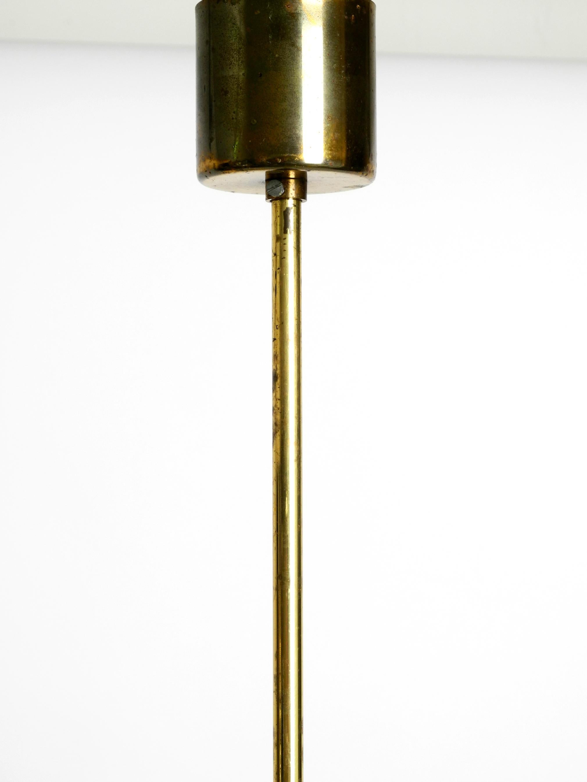 Beautiful three staged 18 arm Mid Century brass chandelier with a long brass rod For Sale 3