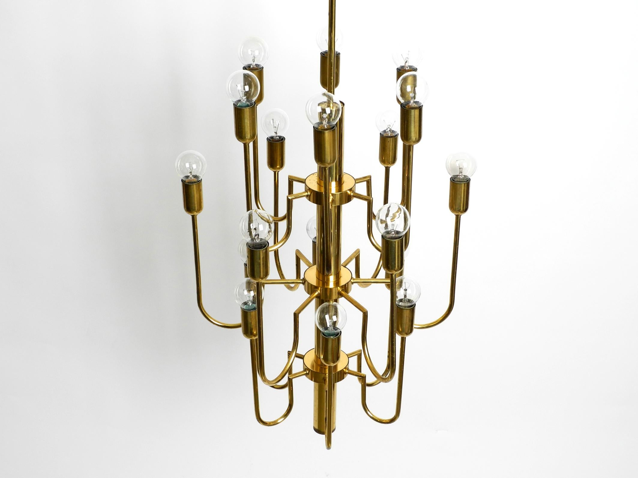 Beautiful Three Staged 18 Arm Midcentury Brass Chandelier with a Long Brass Rod For Sale 7