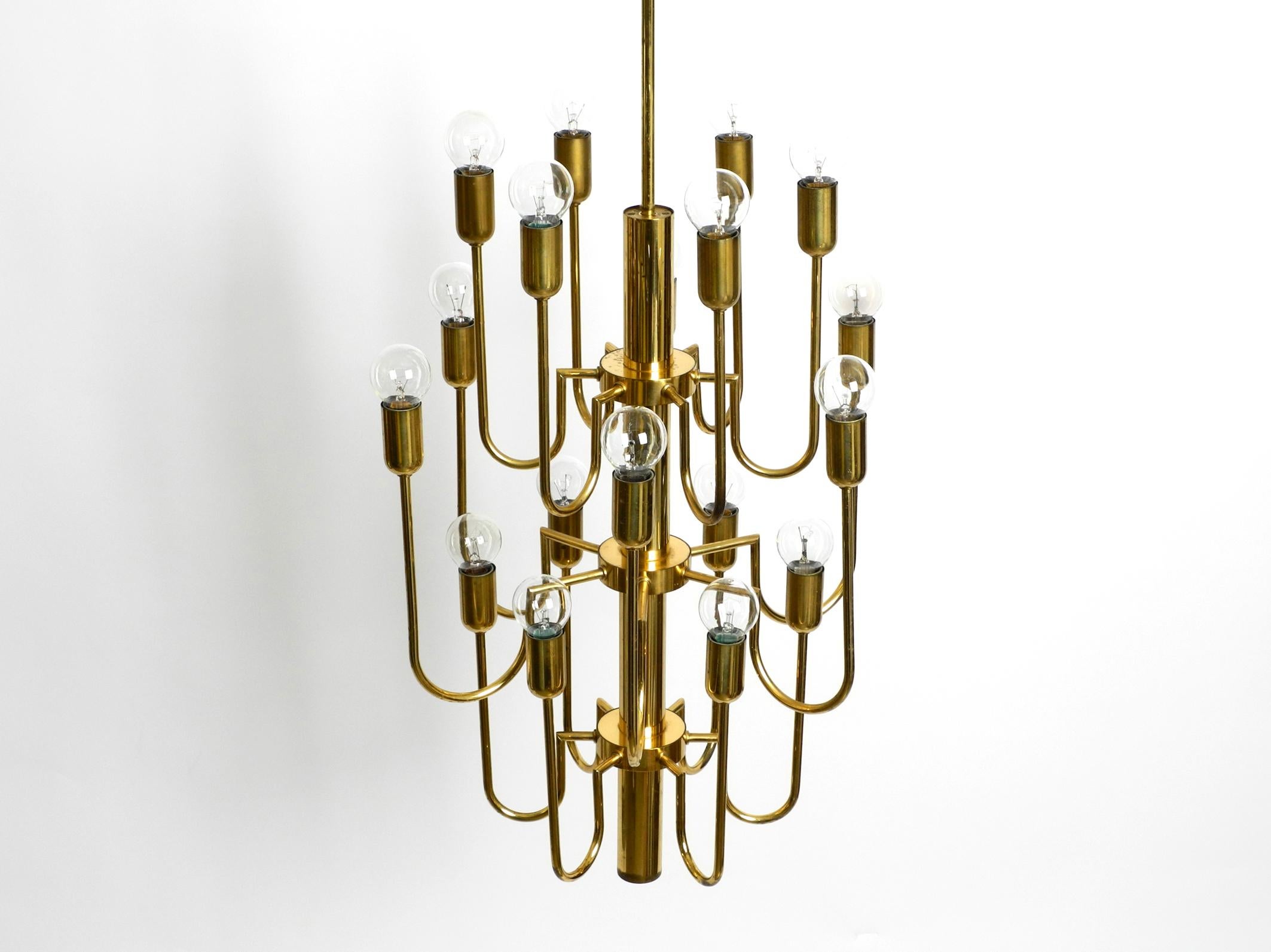 Beautiful Three Staged 18 Arm Midcentury Brass Chandelier with a Long Brass Rod For Sale 8