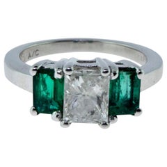 Beautiful Three-Stone Dark Green Colombian Emerald and Diamond White Gold Ring