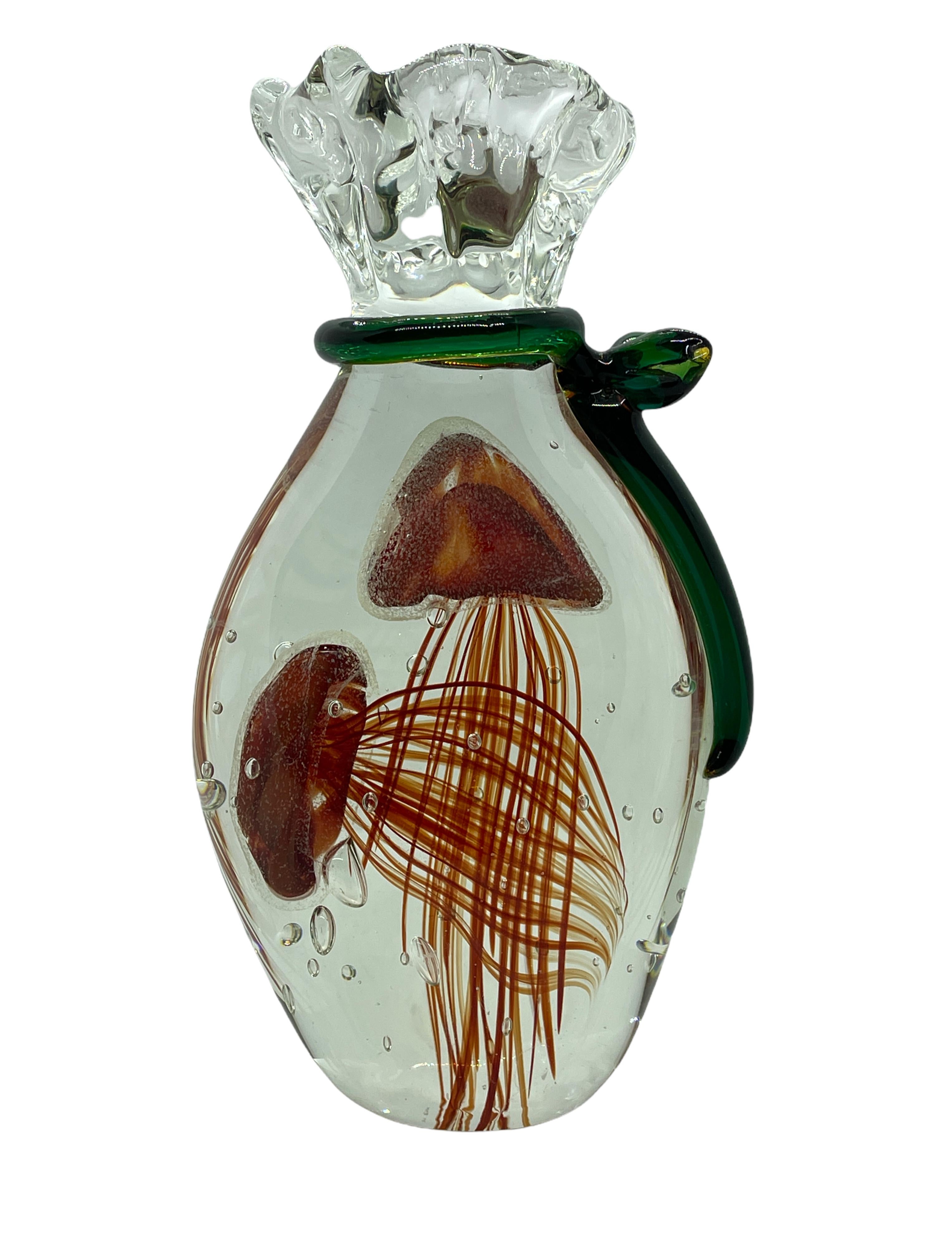 Beautiful stunning Murano hand blown aquarium design Italian art glass sculpture. Showing two Jellyfish inside, in red and orange color, floating on controlled bubbles. A beautiful nice addition at your table, credenza or side board. Marked with