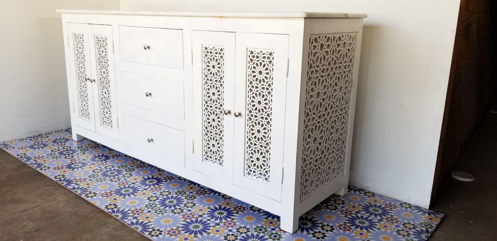 Beautiful Bathroom Vanity for living room from Moroccan with two sink and three drawers. A indigenous white wood with marble top and the laser cut for the sink hole is man made.
Fabulous and original piece!
 