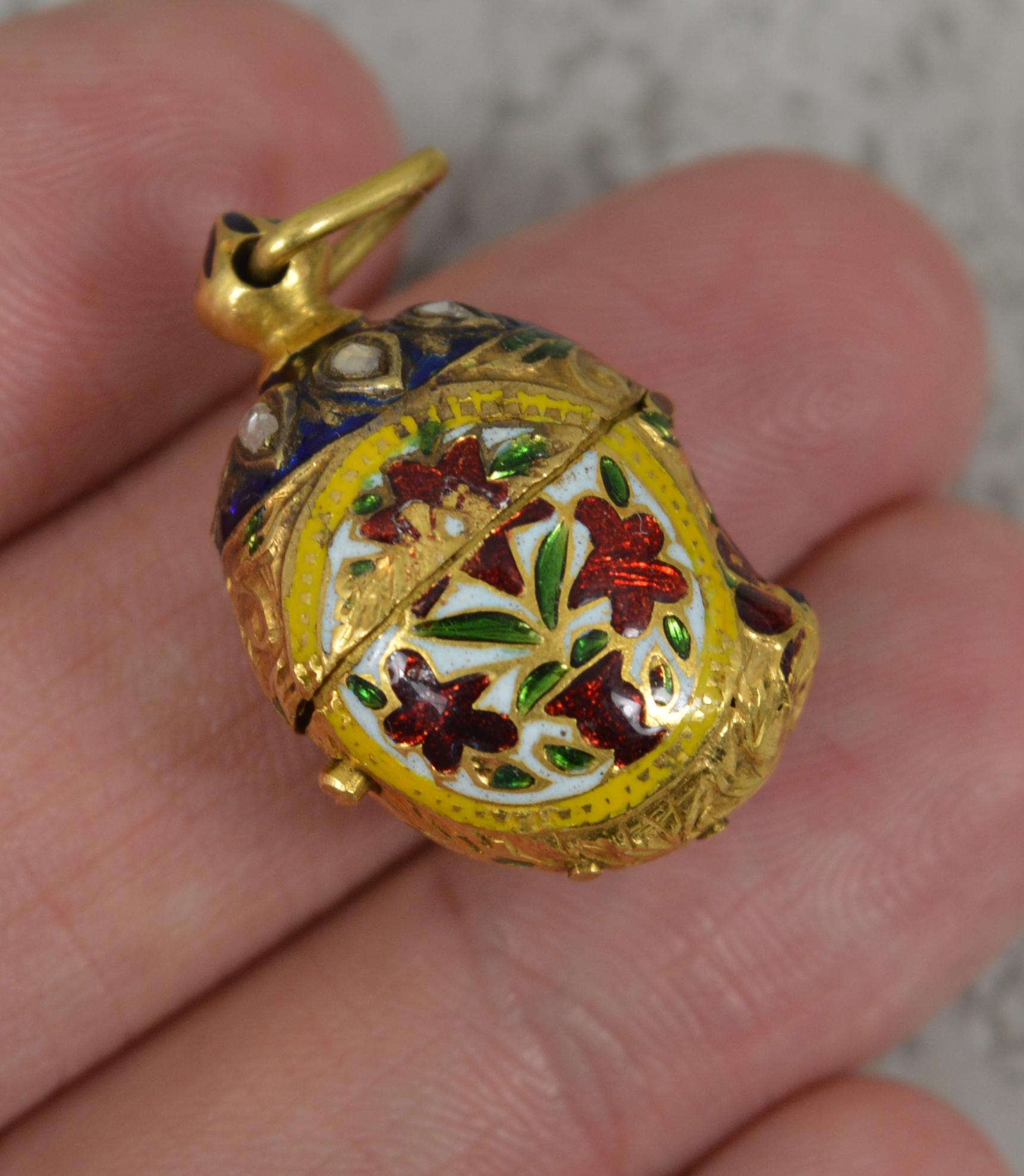 A superb Victorian period pomander box.
Solid 20 carat yellow gold example with red, green, blue and white enamel and set with rose cut diamonds to the lid.
Hand made example with hinge opening.

CONDITION ; Very good. Crisp design. Issue free.