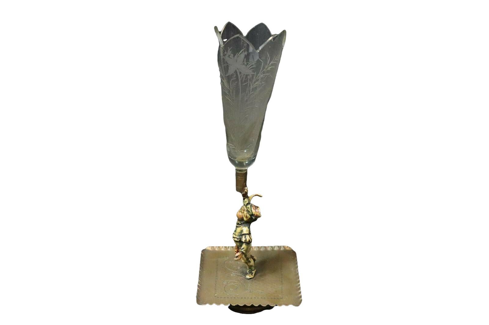 Beautiful crystal glass vase with Vienna bronze figural stand. Glass with graving, bronze figure cold painted. A beautiful piece of art for any room or just to display in your collection.