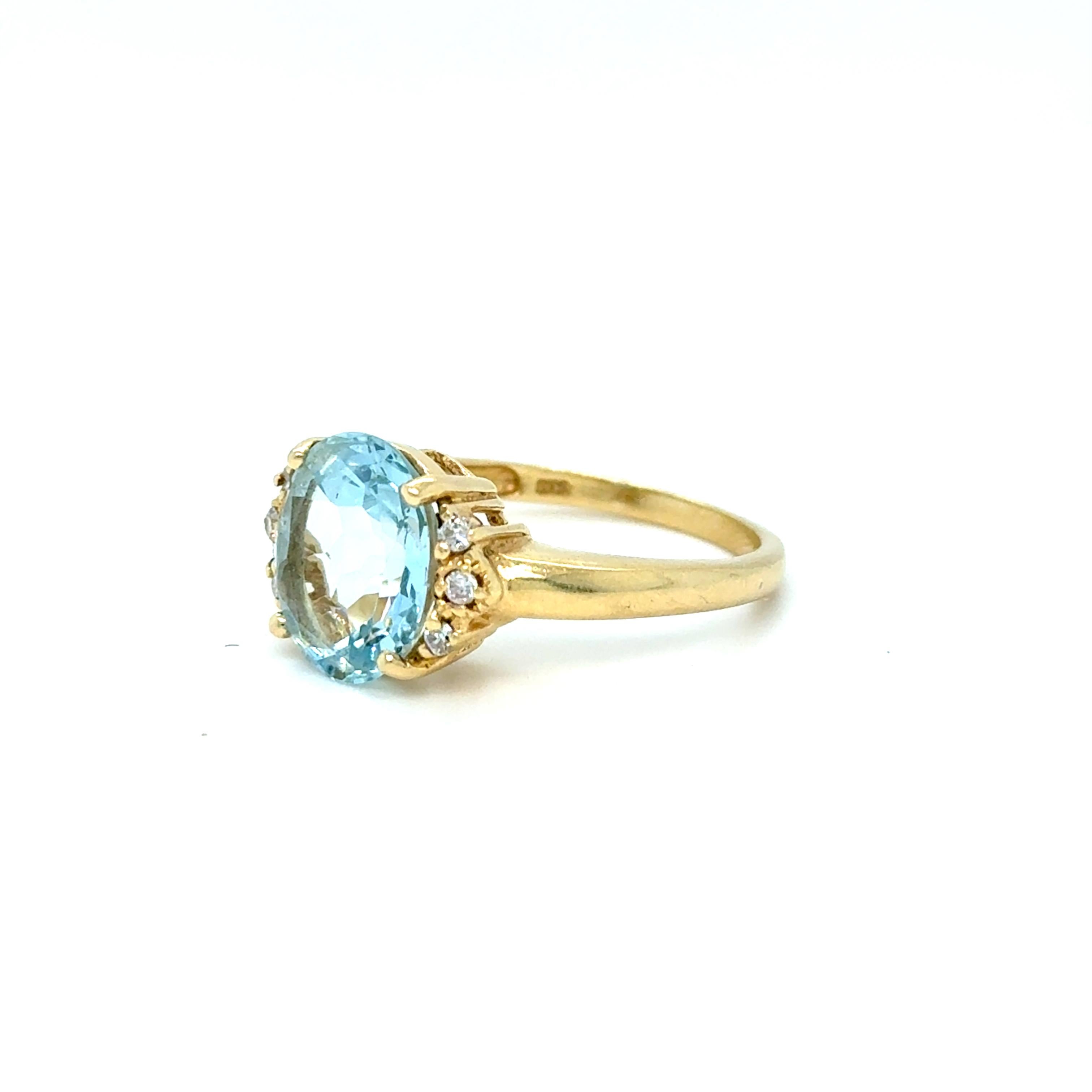 Modern Beautiful Vintage 14K Yellow Gold Aquamarine  and Diamond Ring Engagement Ring. For Sale
