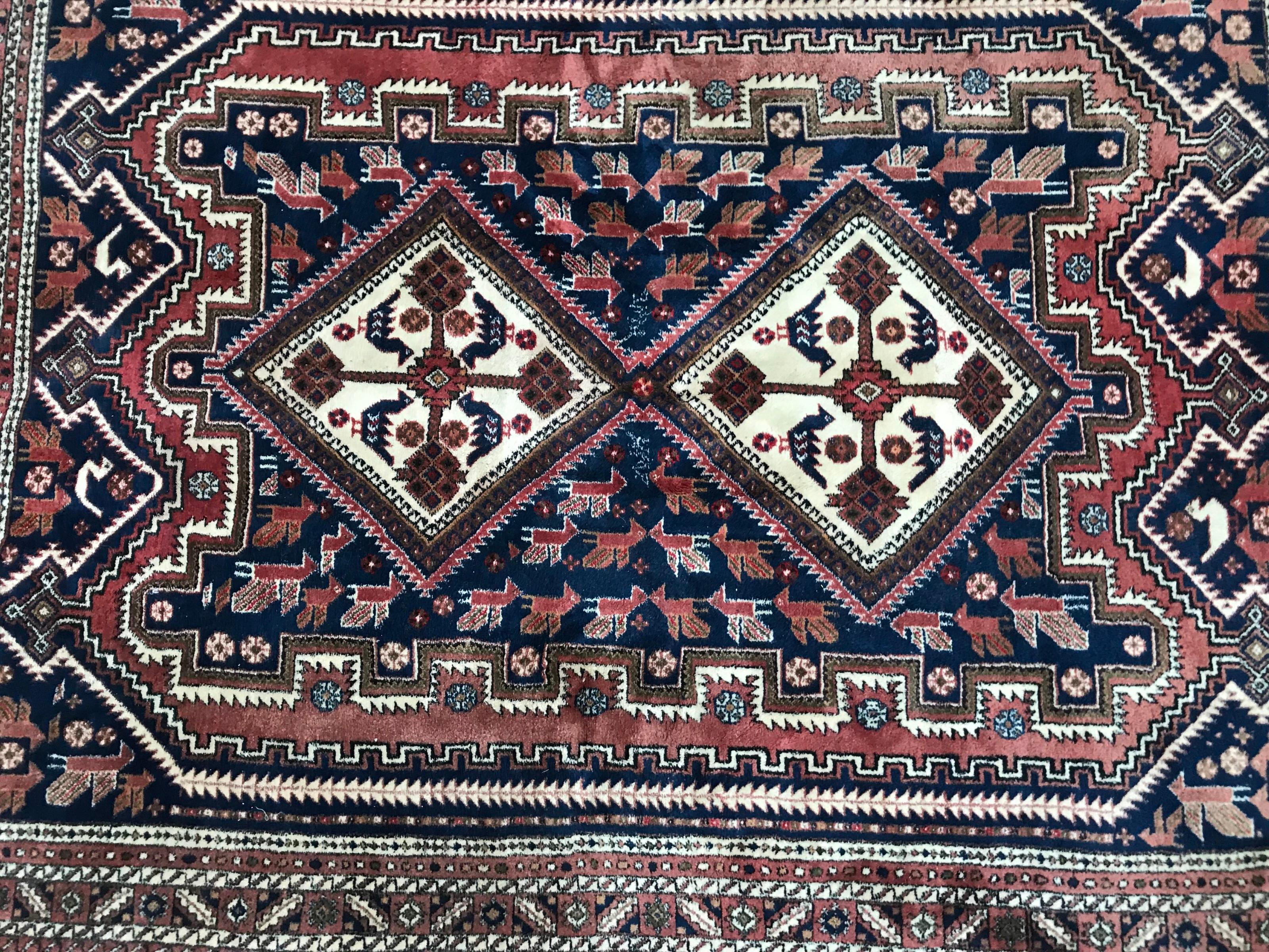 Nice mid-20th century rug with beautiful geometrical design and nice colors with blue, red and green, entirely hand knotted with wool velvet on cotton foundation.