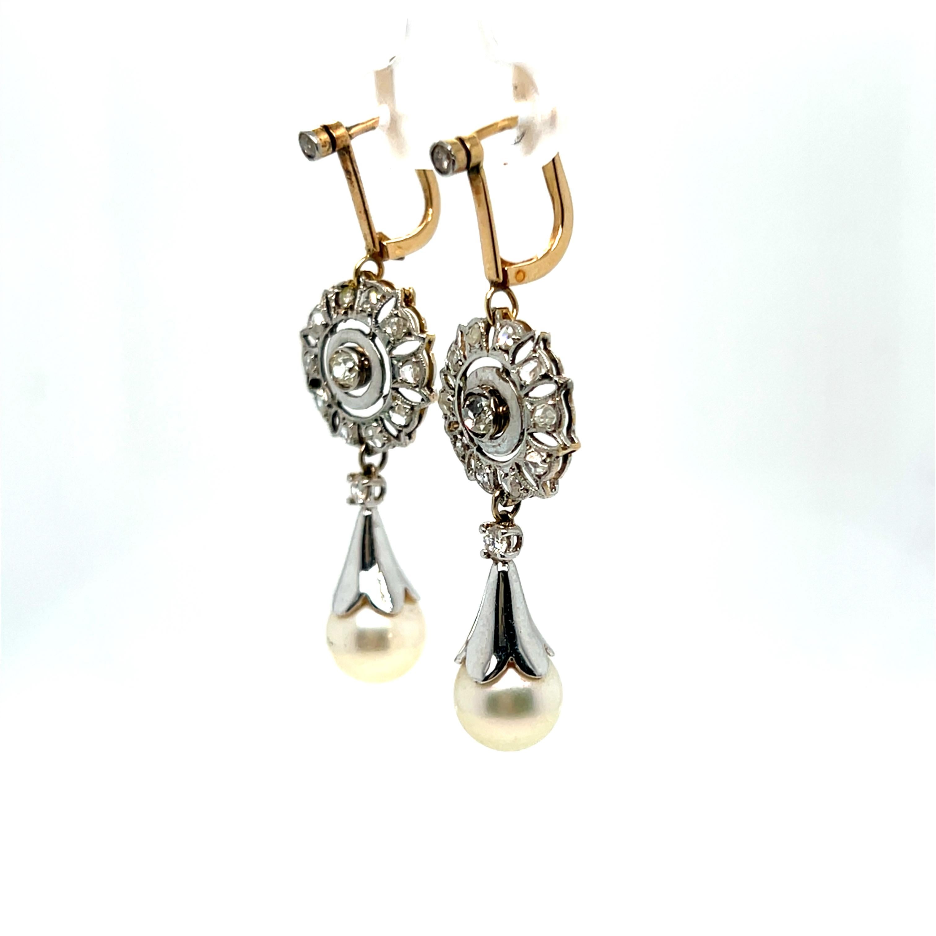 These Beautiful Late Art Deco Diamond and Pearl Earrings are just lovely! Crafted in 14K Yellow Gold, and topped in 18K White Gold, the earrings feature beautiful movement, beaded edges, Old Mine and Single Cut Diamonds, and wonderful Pearl Drops.