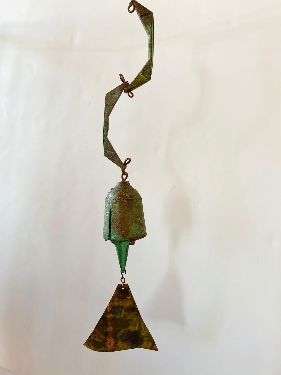 Beautiful vintage bronze Cosanti bell by Paolo Soleri. Uncommon shape and design. Fantastic patina and a great sound. Signed. A unique piece from a celebrated artist. Bell 2.5