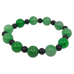 Magnifique bracelet chinois vintage en jadeite vert émeraude pour poignet jusqu'à 7.5".