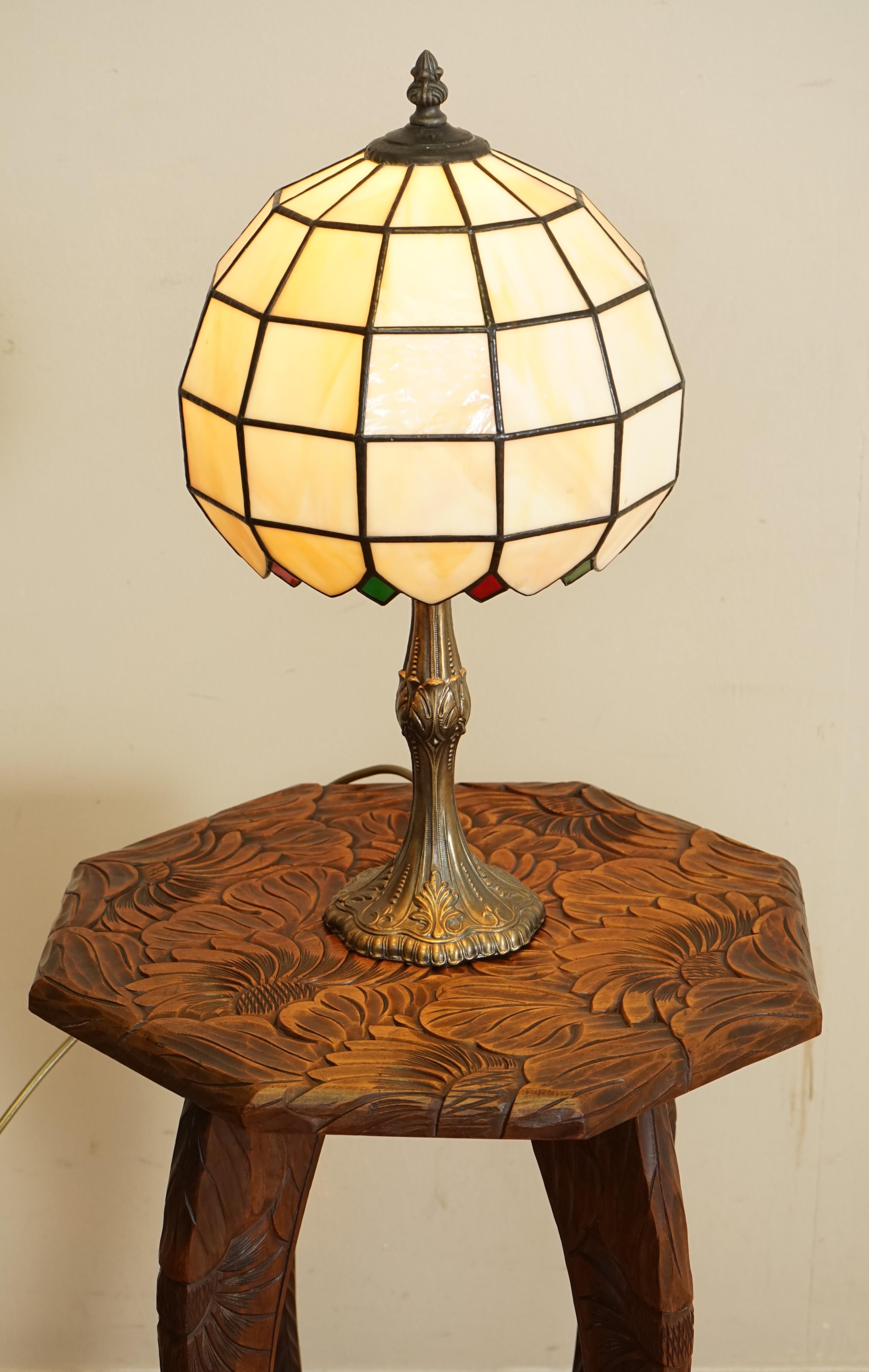 We are so excited to present to you this Lovely Vintage Tiffany & Co Style Lamp. 

Please note that the lamp doesn't come with the bulb.

We have lightly restored this by giving it a hand clean all over.

Please carefully look at the pictures