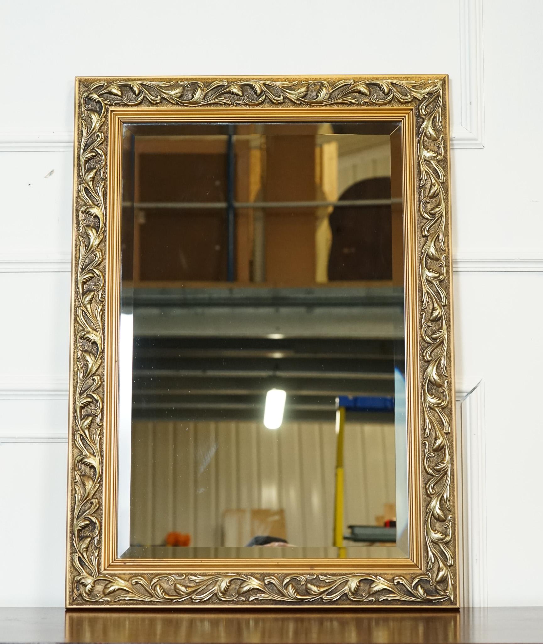 Hand-Crafted BEAUTIFUL VINTAGE CUSHIONED GiLTWOOD BEVELLED MIRROR For Sale