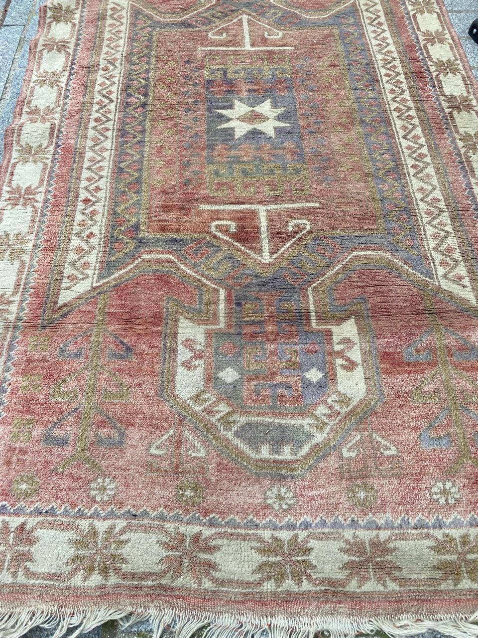 Preciosa alfombra turca vintage descolorida de Bobyrug siglo XX en venta