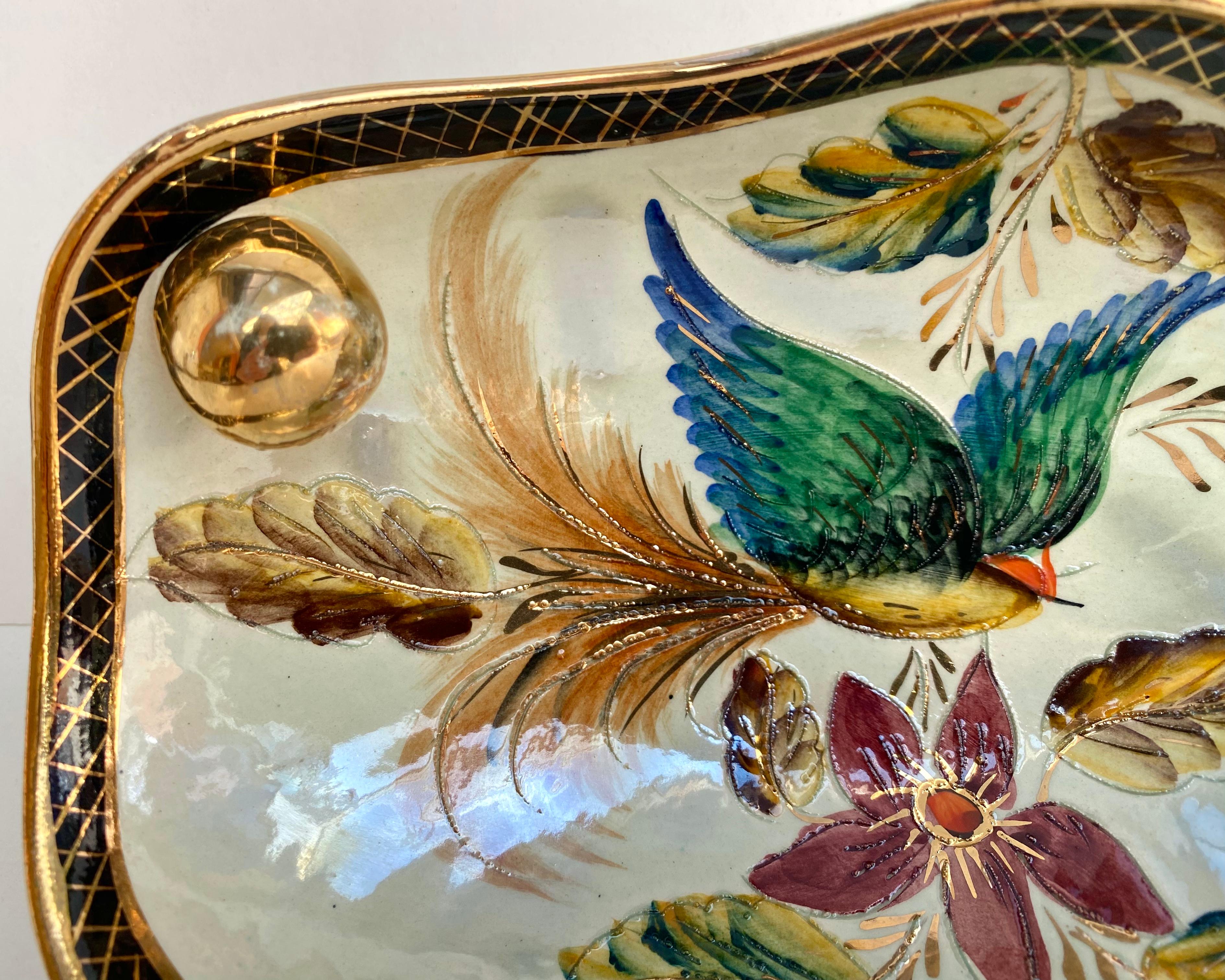 Vintage H. Bequet Quaregnon Design Porcelain Panel with Hand Painted Bird and Leaf Design.

Beautiful decorative plate or wall panel hand made and hand painted, with a bird and leaves by H Bequet from Belgium. 1960s.

The picture has raised gold