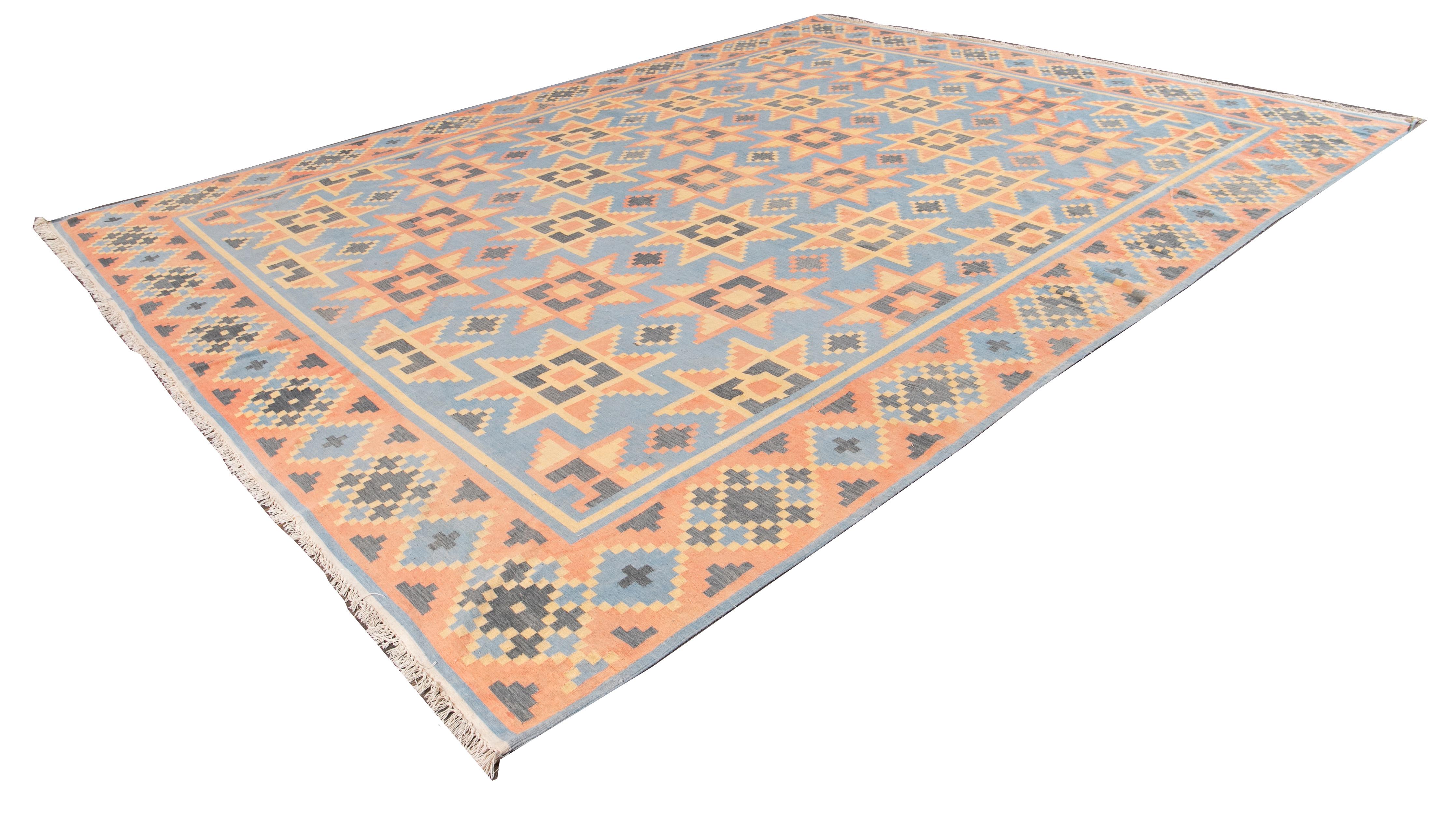 Vintage Cotton  Dhurrie Kilim Art Deco rug with a blue field and orange and grey accents with an all-over geometric design. 

This rug measures 11' 9