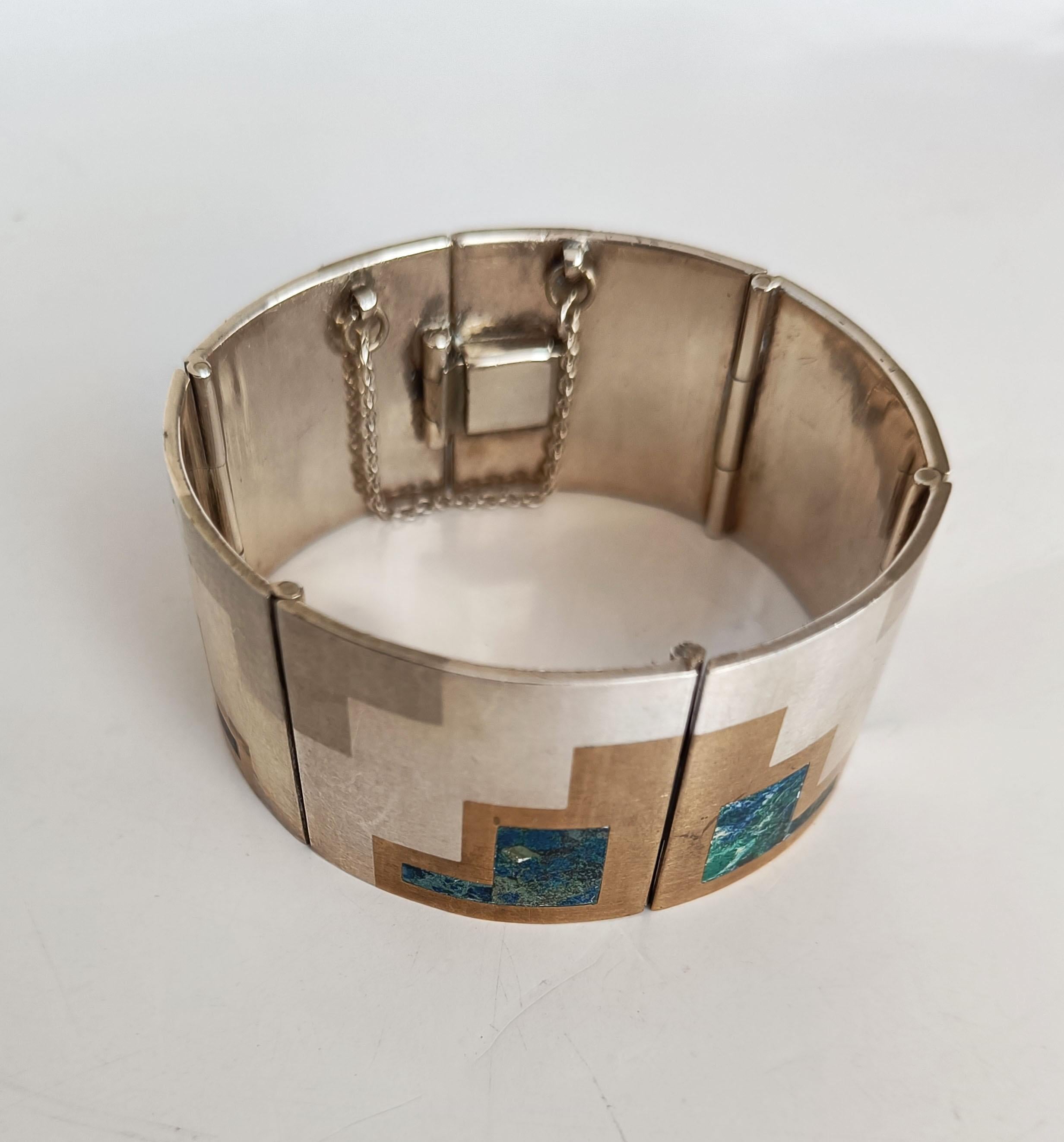 Schöne Vintage Mexican Taxco Silber Modernist Design Armband mit gemischten Metallen und Abalone-Inlays
Markiert  JL Metales 925 Sterling Marke
1960er Jahre
Guter Zustand.