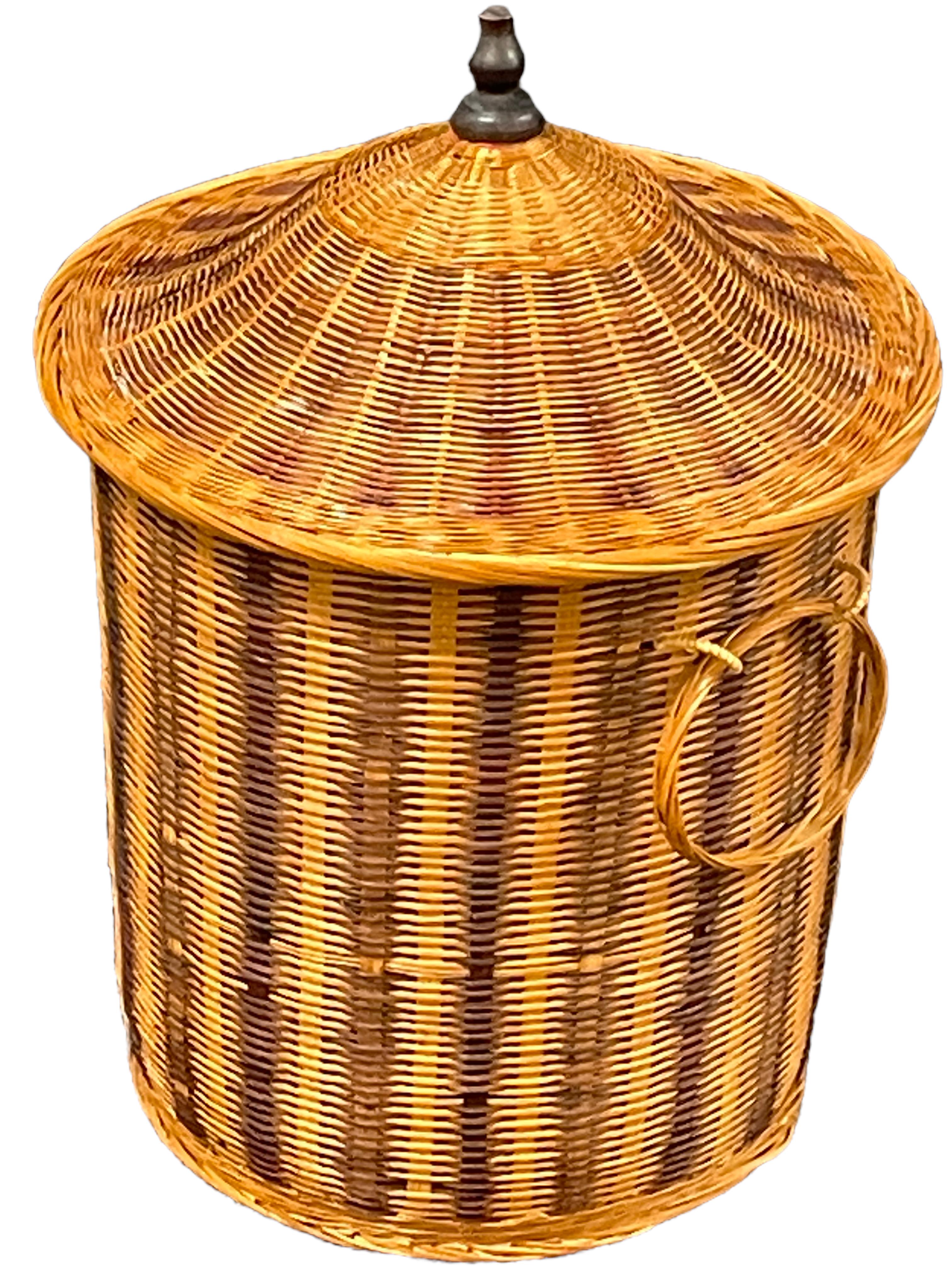 Offered is an absolutely stunning small 1980s vintage wicker laundry basket hamper with lid and wicker handles. Overall very good vintage condition with light ware consistent with age and use. A nice addition to any room. You can also use it as a