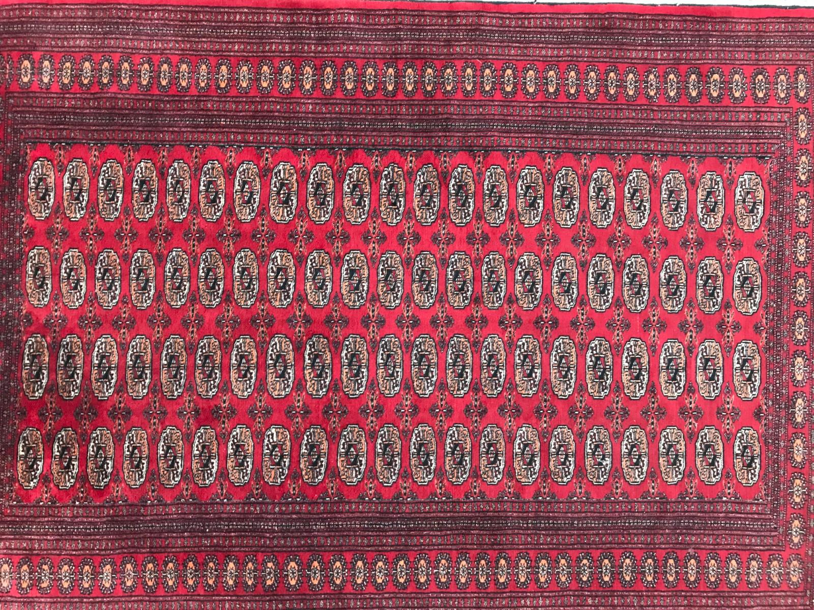 A red field Boukhara design rug from Pakistan, beautiful geometrical Bokhara design, finely and entirely hand knotted with wool velvet on cotton foundations.

✨✨✨

