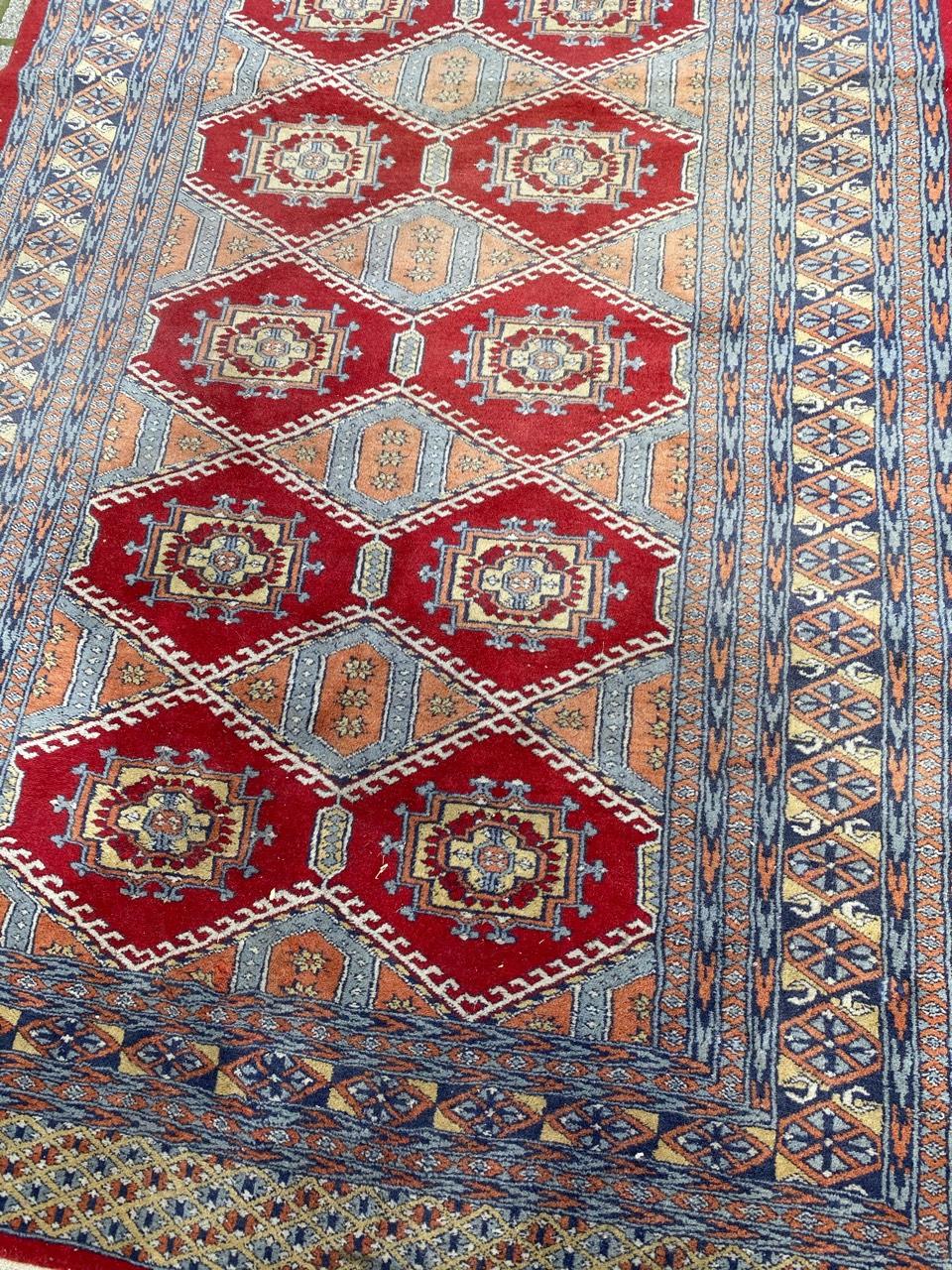 Nice 20th century rug with a Turkmen design and beautiful colors with red, orange and blue, entirely and finely hand knotted with wool velvet on cotton foundation.

✨✨✨
