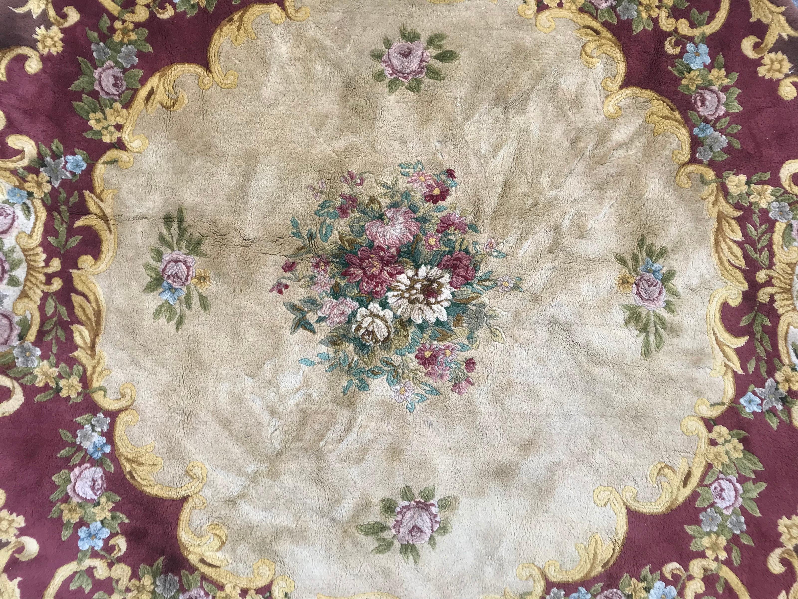 Very beautiful fine round Savonnerie rug with a floral Aubusson design and beautiful colors with yellow, purple, yellow, blue, green and red, entirely hand knotted with wool velvet on cotton foundation.