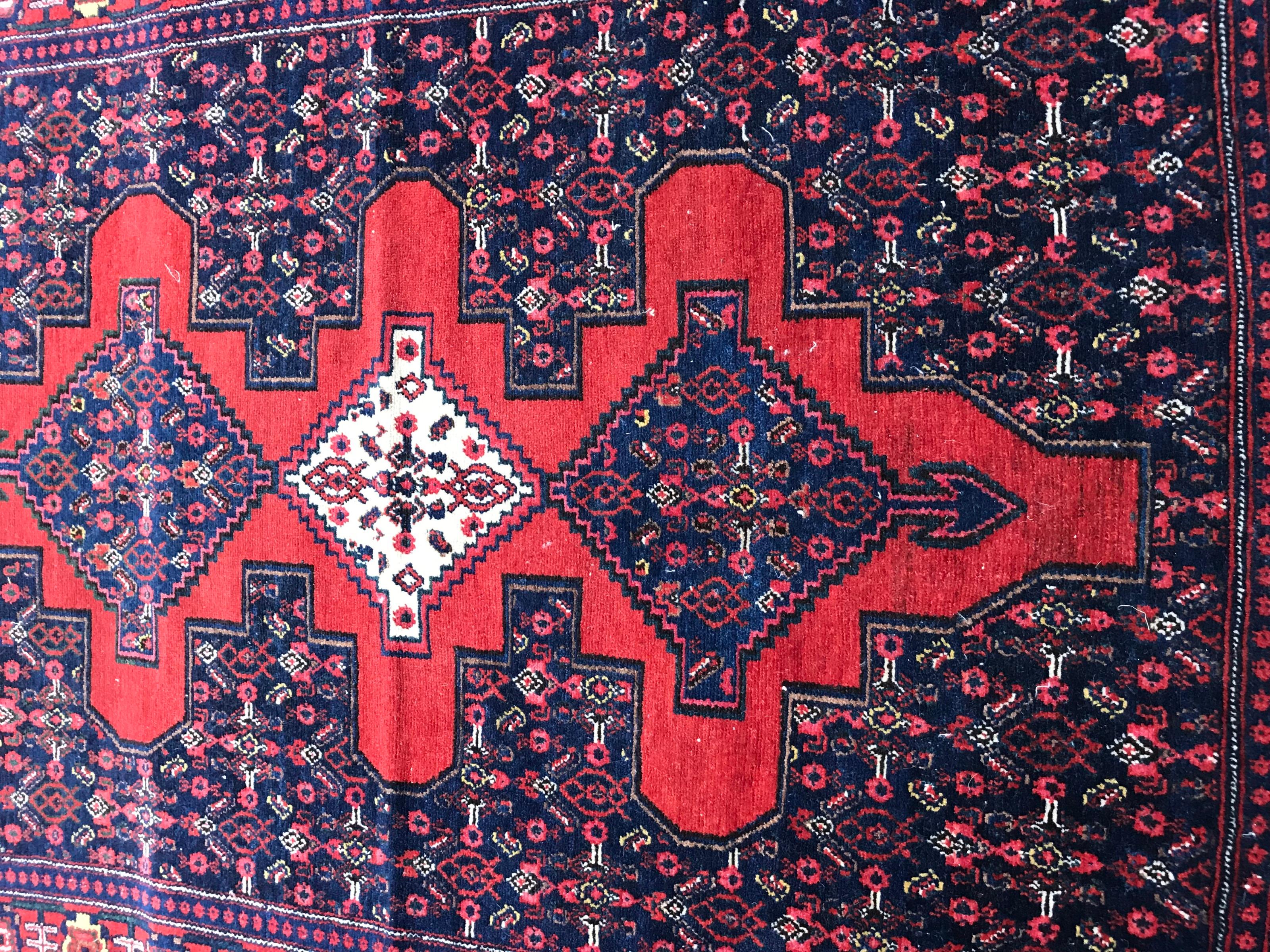 Beautiful mid-20th century rug with nice geometrical design and beautiful colors with red and blue, finely hand knotted, wool velvet on cotton foundation.

✨✨✨
