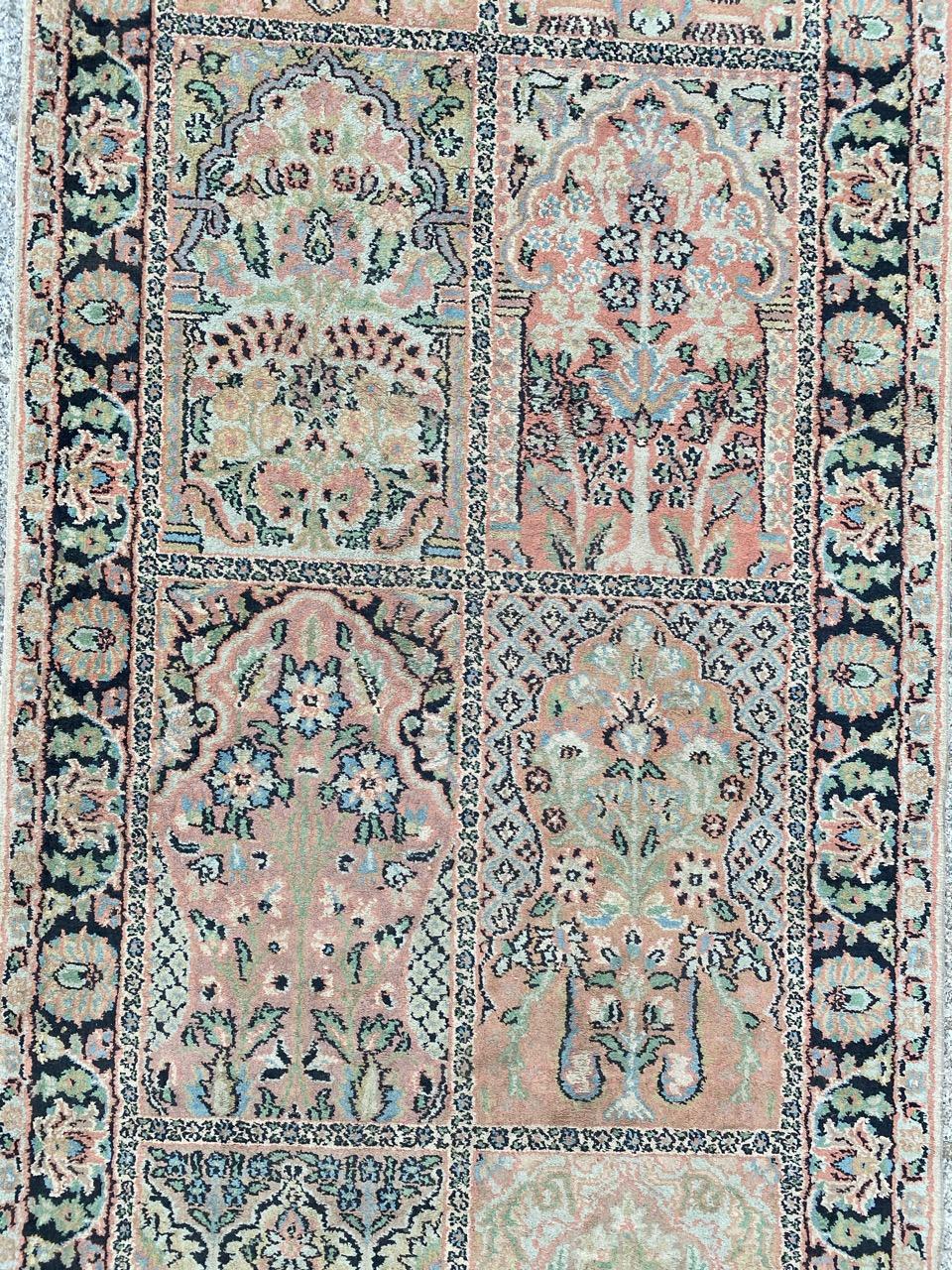 Late 20th century silk and cotton Kashmir runner with beautiful floral design and light colors, entirely hand knotted with silk and cotton velvet on cotton foundation.