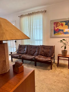 Beautiful vintage three seat high back “Hunter” sofa in leather