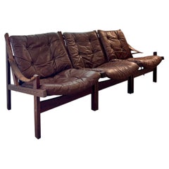 Beautiful vintage three seat high back “Hunter” sofa in leather