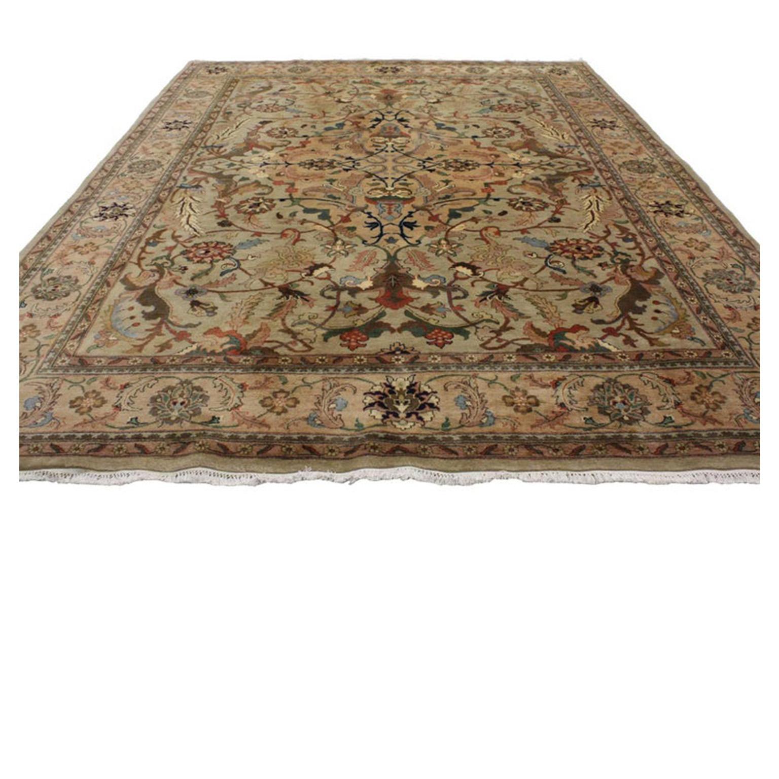 A beautiful vintage traditional rug with Persian style Herati design. This hand knotted wool vintage Persian Herati style rug features traditional designs with floral and foliage forms and a decorative border. Perfect for a dining room, living room