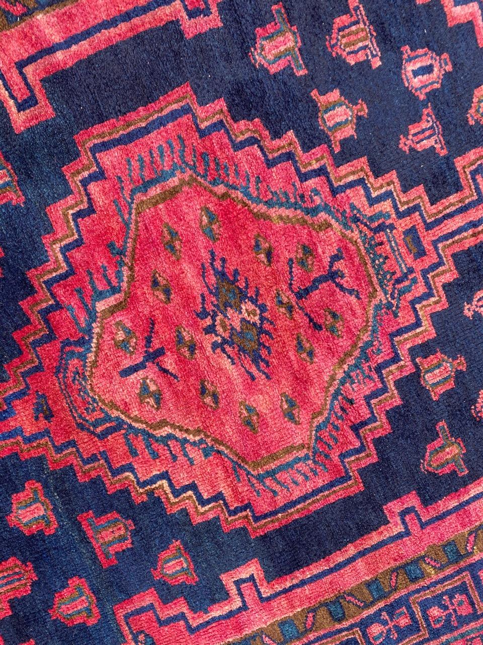 Nice midcentury rug with a tribal design and red and blue colors, entirely hand knotted with wool velvet on cotton foundation.

✨✨✨
