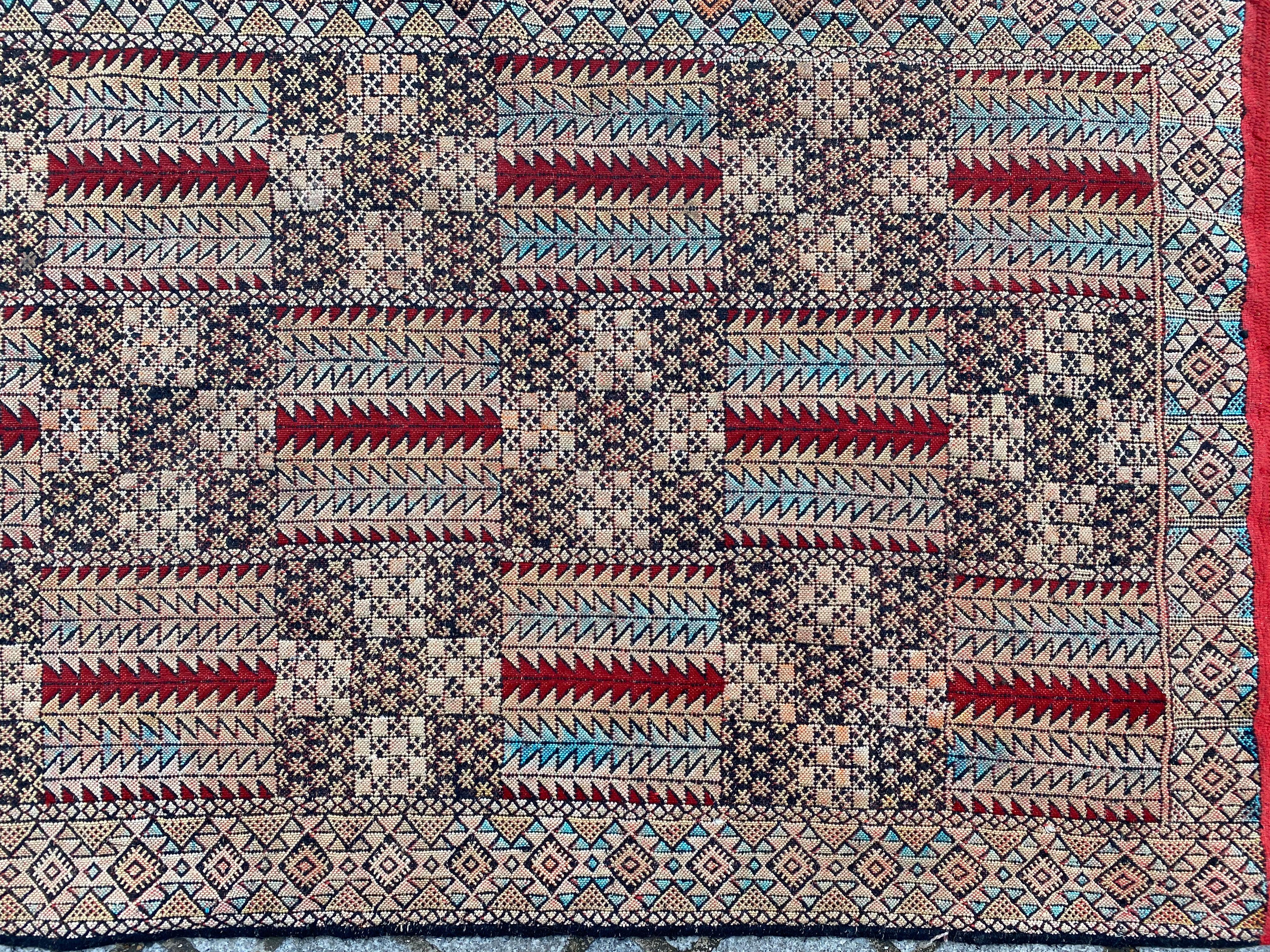 Very beautiful midcentury tribal Moroccan Kilim with a geometrical design and nice colors with red, orange, blue and black, entirely handwoven with wool and silk on cotton foundation.

✨✨✨
