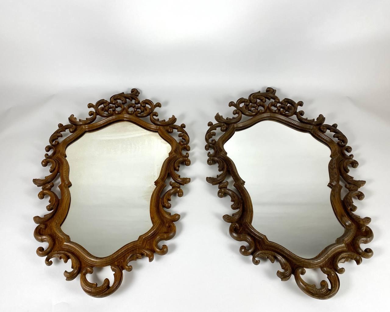 Empire style vintage wall mirror in beautiful wooden frame.

This vintage mirror has been expertly crafted.

Echoing the refined palatial style of the last century, this exquisitely hand-carved wood-framed wall mirror is infused with a sumptuous
