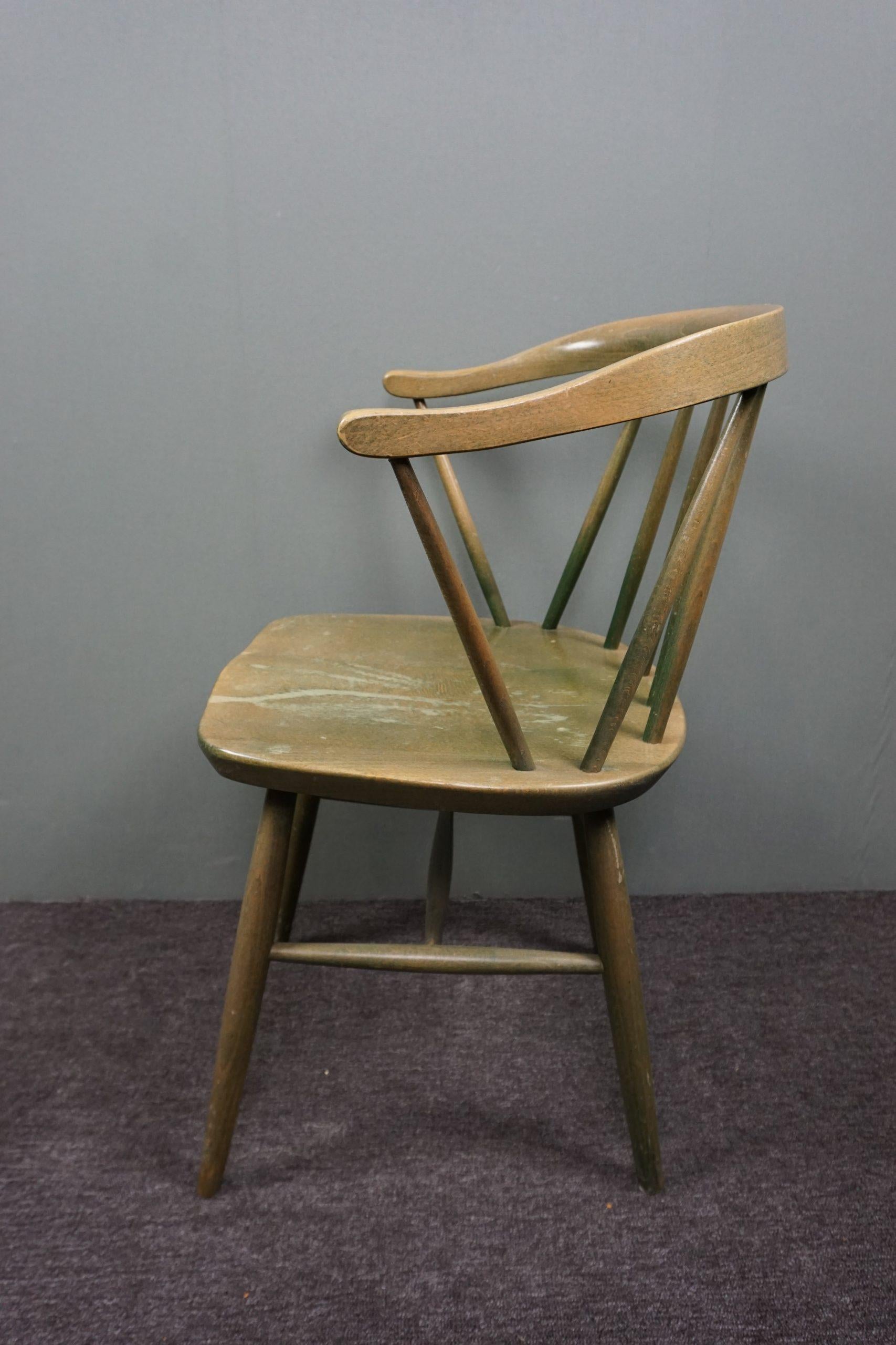 Beautiful vintage worn green spindle chair In Fair Condition For Sale In Harderwijk, NL