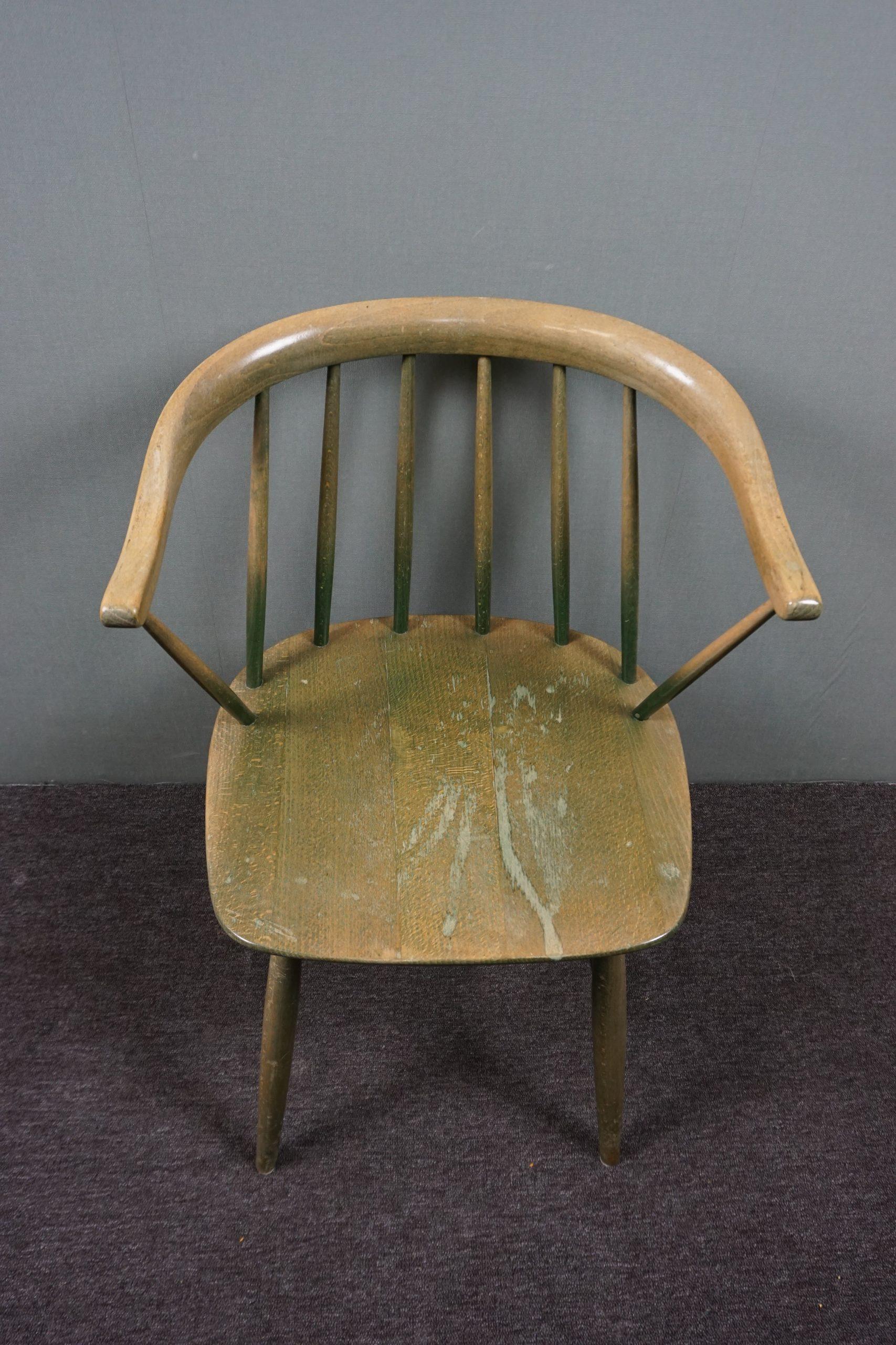 Wood Beautiful vintage worn green spindle chair For Sale