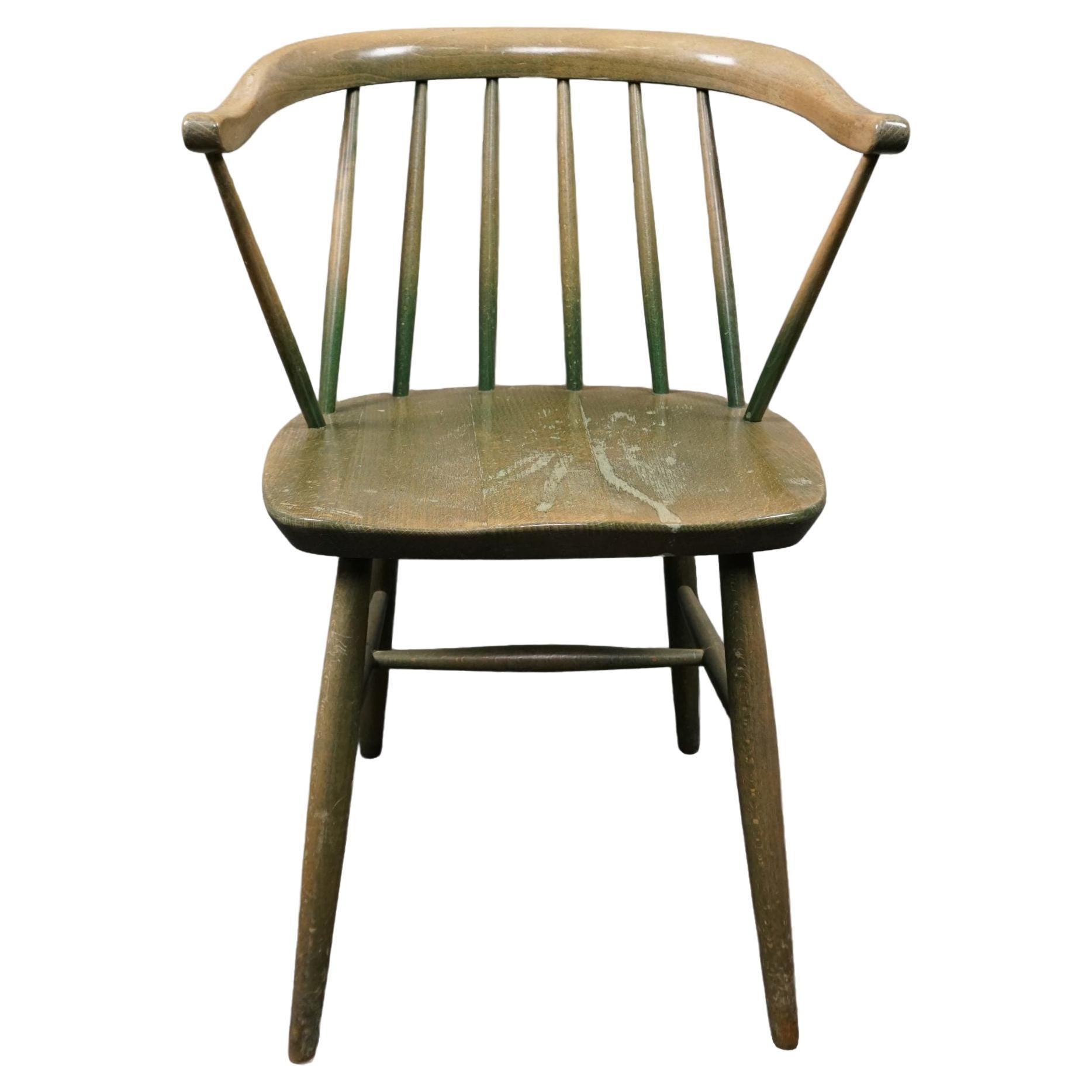 Beautiful vintage worn green spindle chair