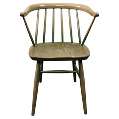 Magnifique chaise vintage à fuseau vert usé